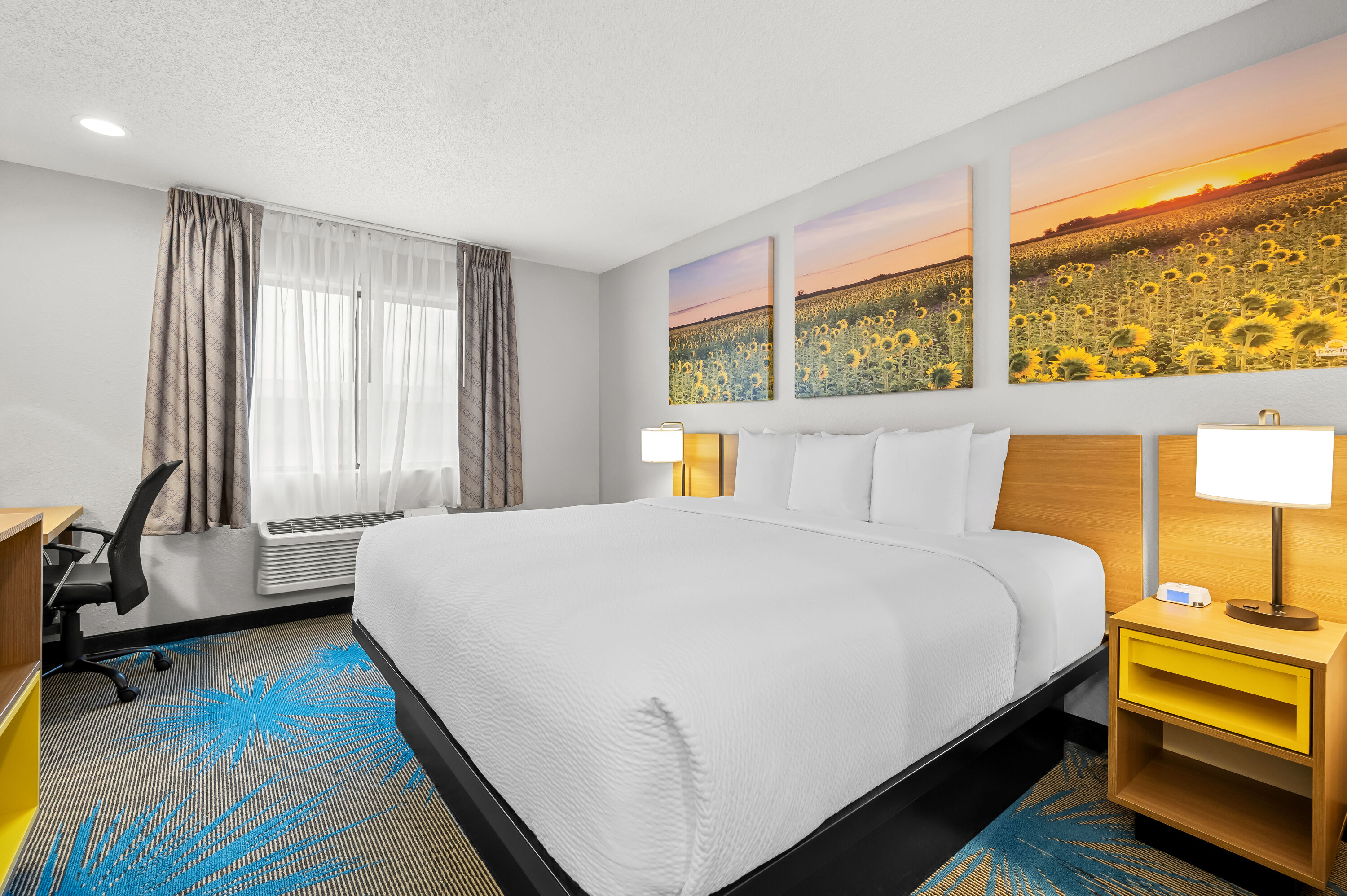 King bed guest room at the Days Inn by Wyndham Wall in Wall, South Dakota