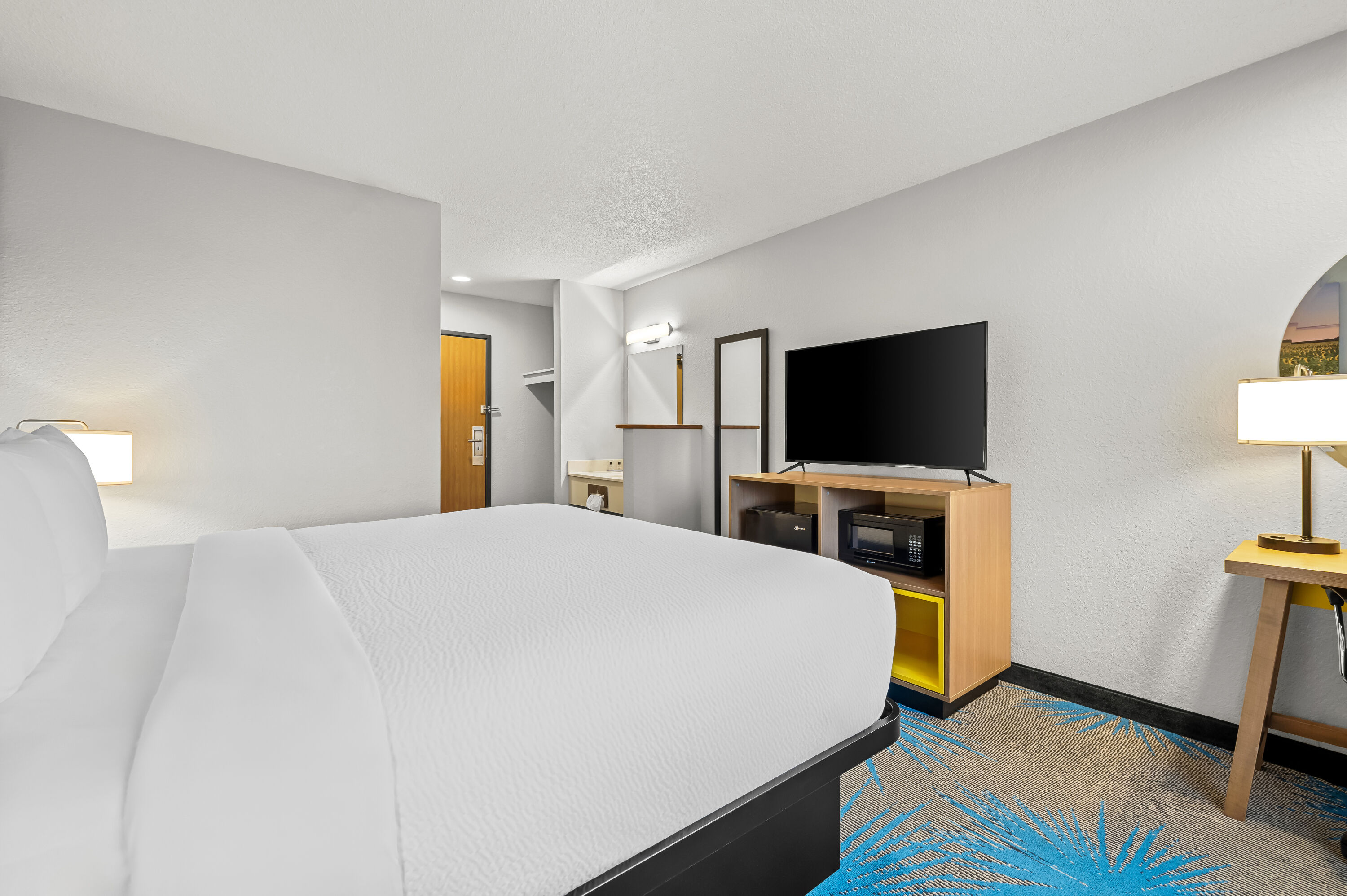 King bed guest room at the Days Inn by Wyndham Wall in Wall, South Dakota