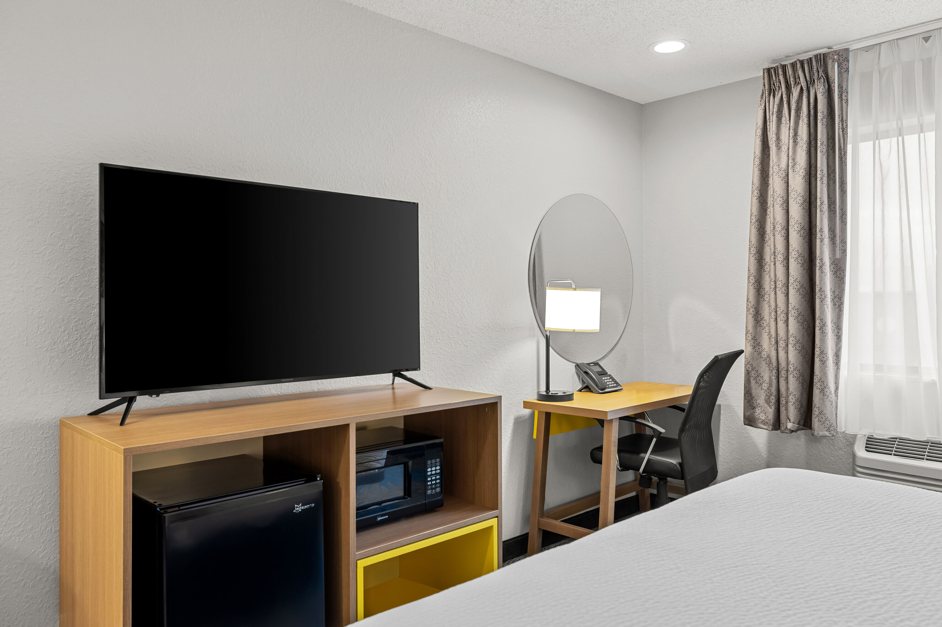 King bed guest room at the Days Inn by Wyndham Wall in Wall, South Dakota