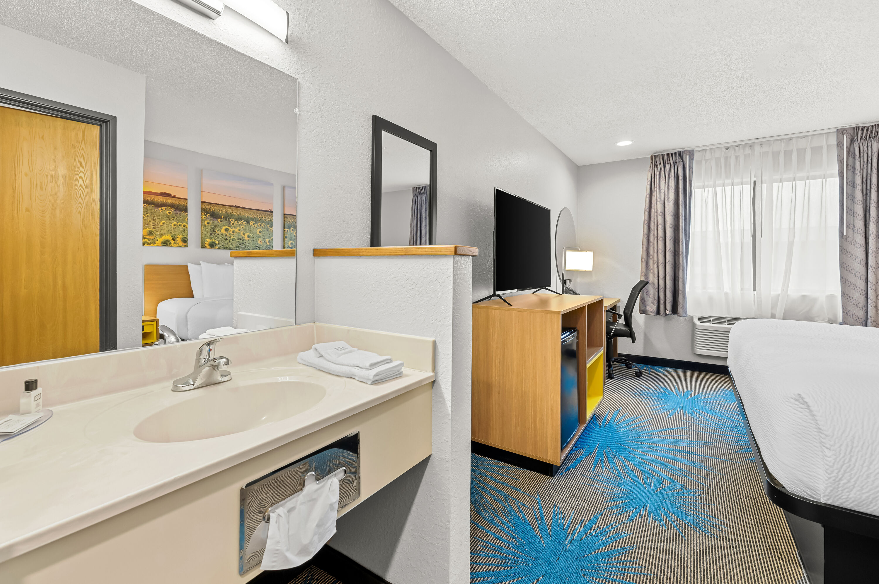 King bed guest room at the Days Inn by Wyndham Wall in Wall, South Dakota