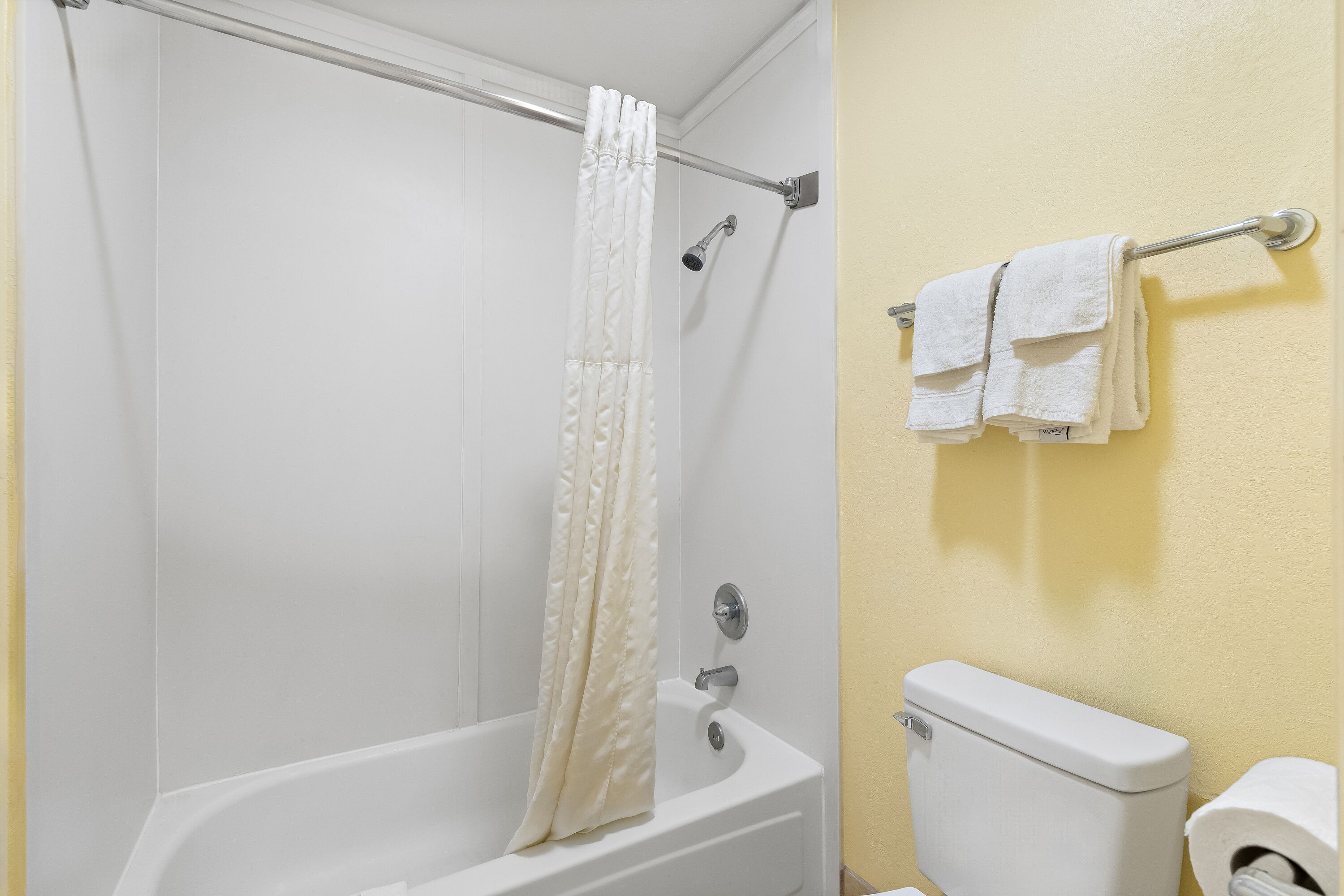 Guest room bath at the Days Inn by Wyndham Cleveland TN in Cleveland, Tennessee