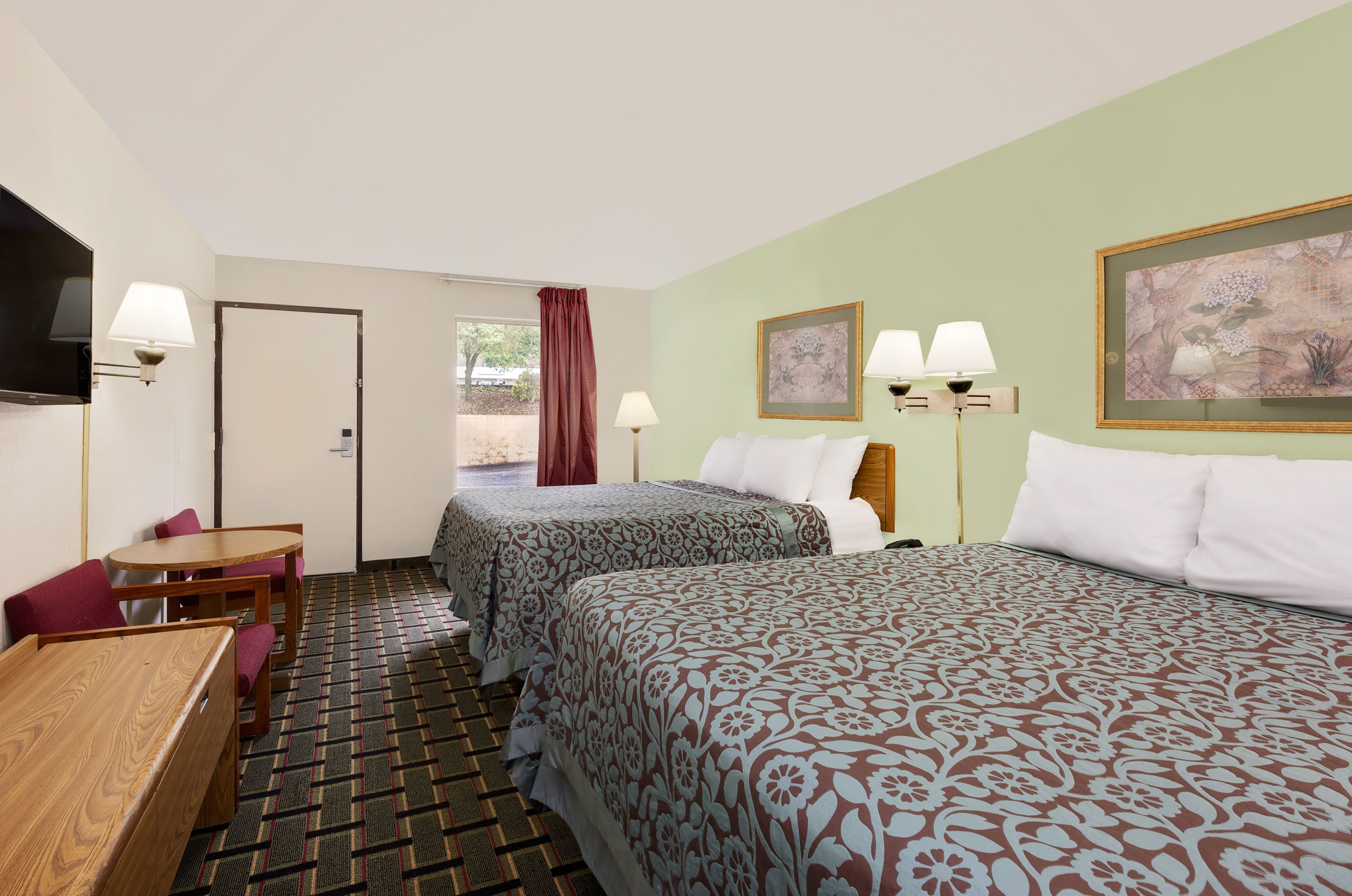 Guest room at the Days Inn by Wyndham Cleveland TN in Cleveland, Tennessee