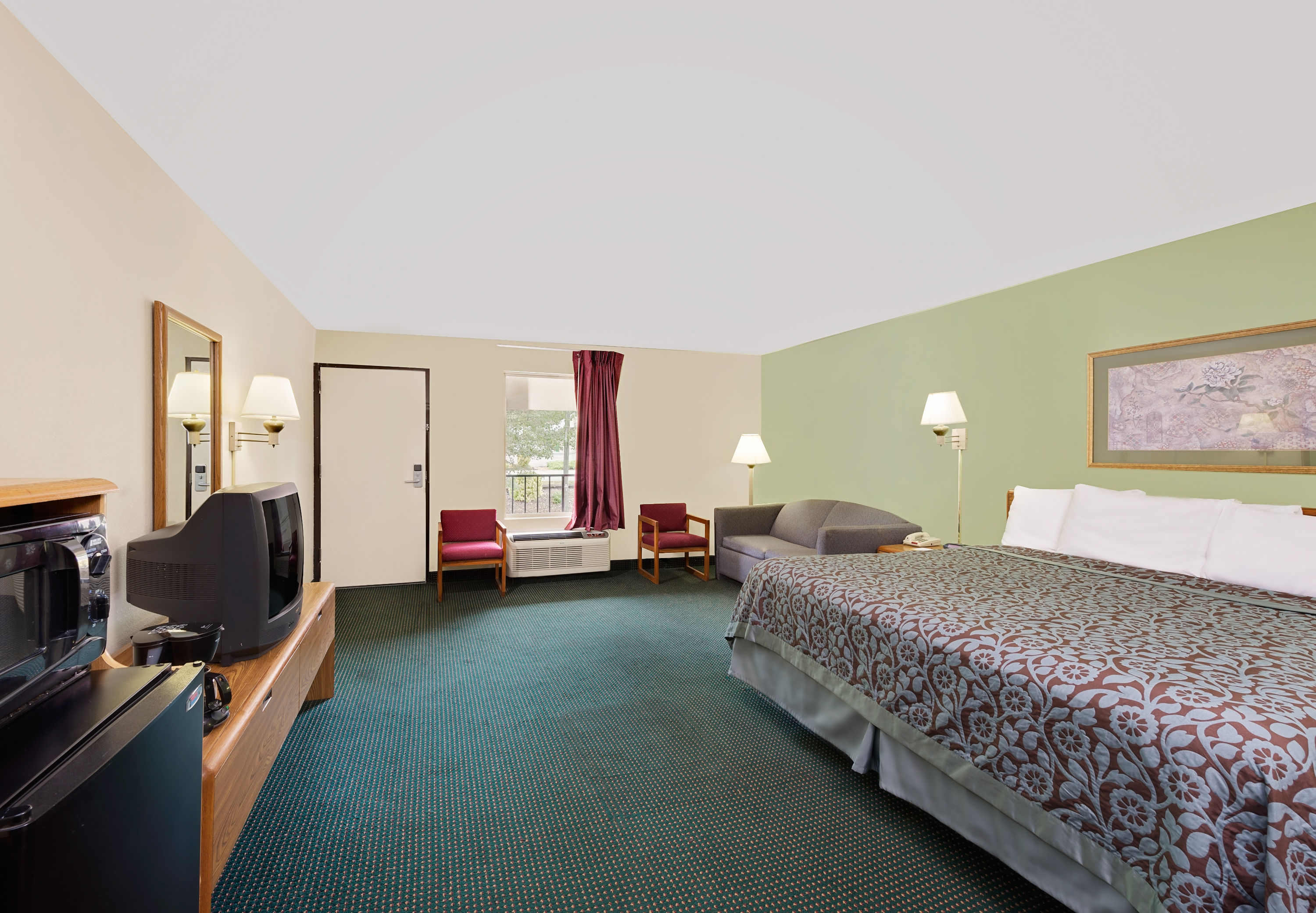 Guest room at the Days Inn by Wyndham Cleveland TN in Cleveland, Tennessee