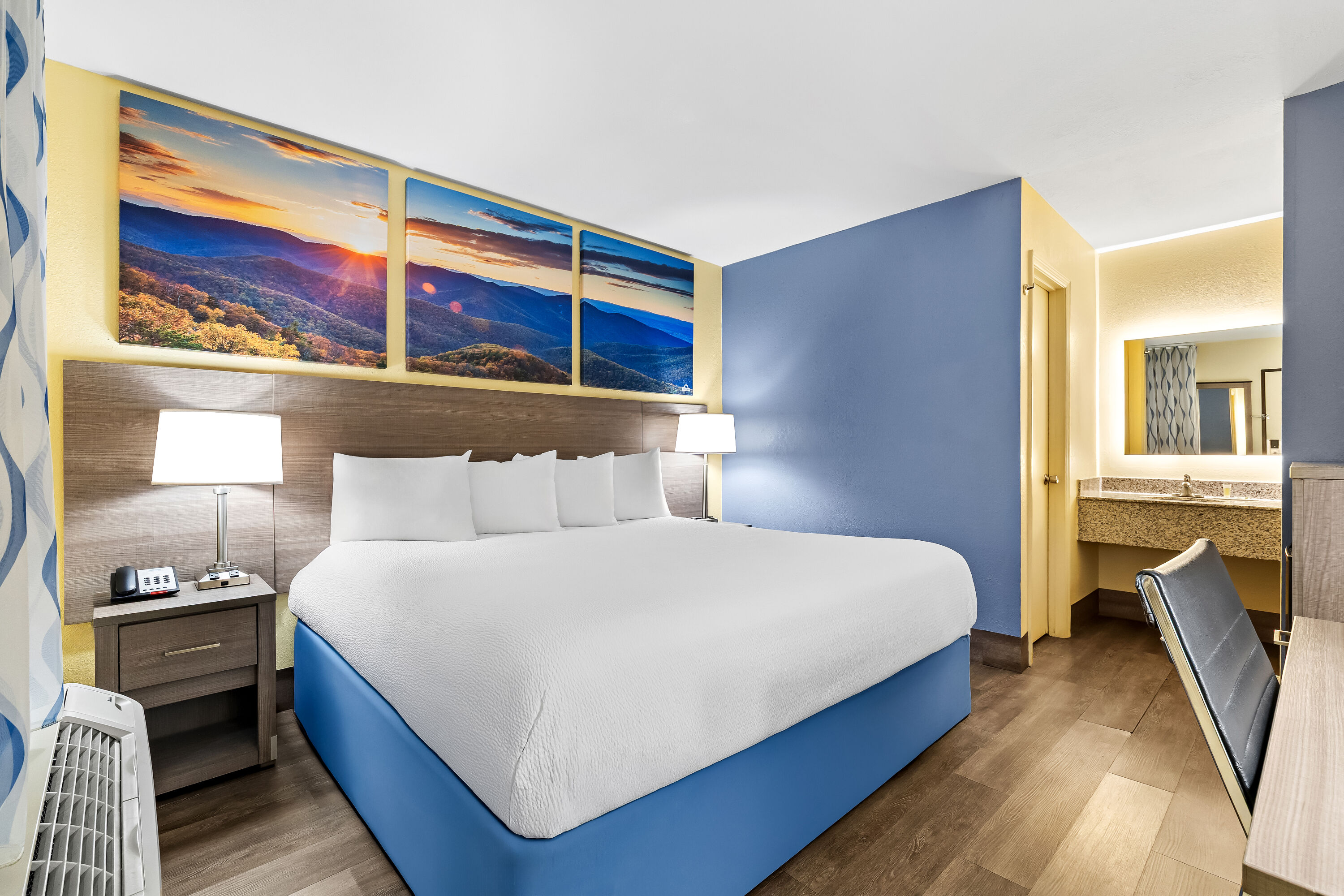 King bed guest room at the Days Inn by Wyndham Cleveland TN in Cleveland, Tennessee