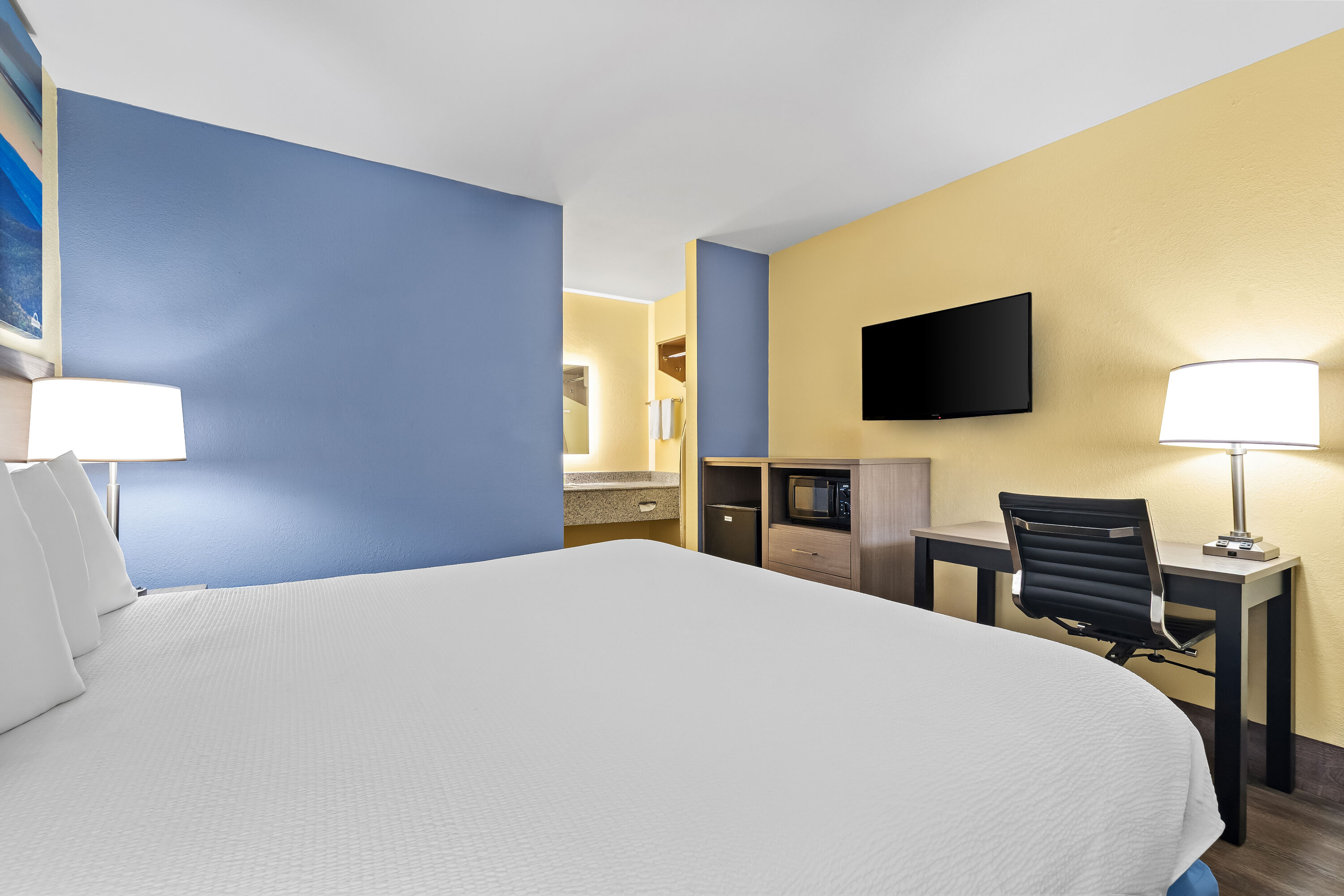 King bed guest room at the Days Inn by Wyndham Cleveland TN in Cleveland, Tennessee