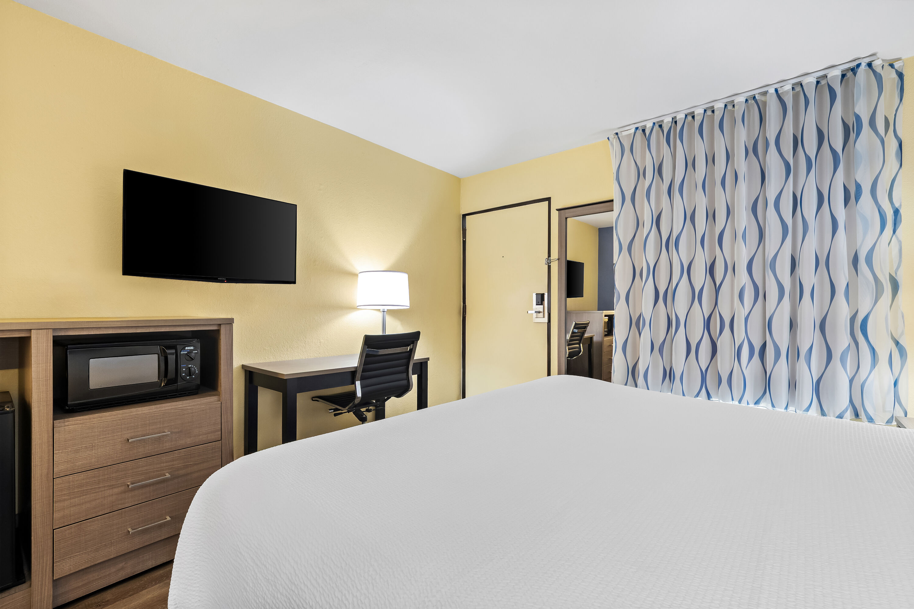 King bed guest room at the Days Inn by Wyndham Cleveland TN in Cleveland, Tennessee