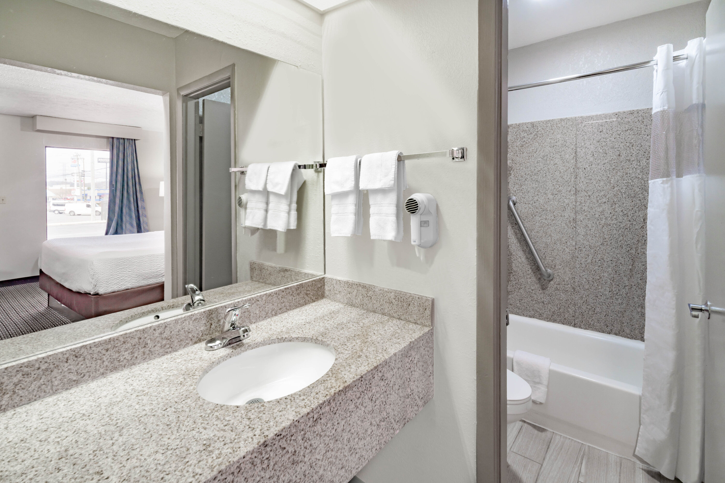 Guest room bath at the Days Inn by Wyndham Cookeville in Cookeville, Tennessee