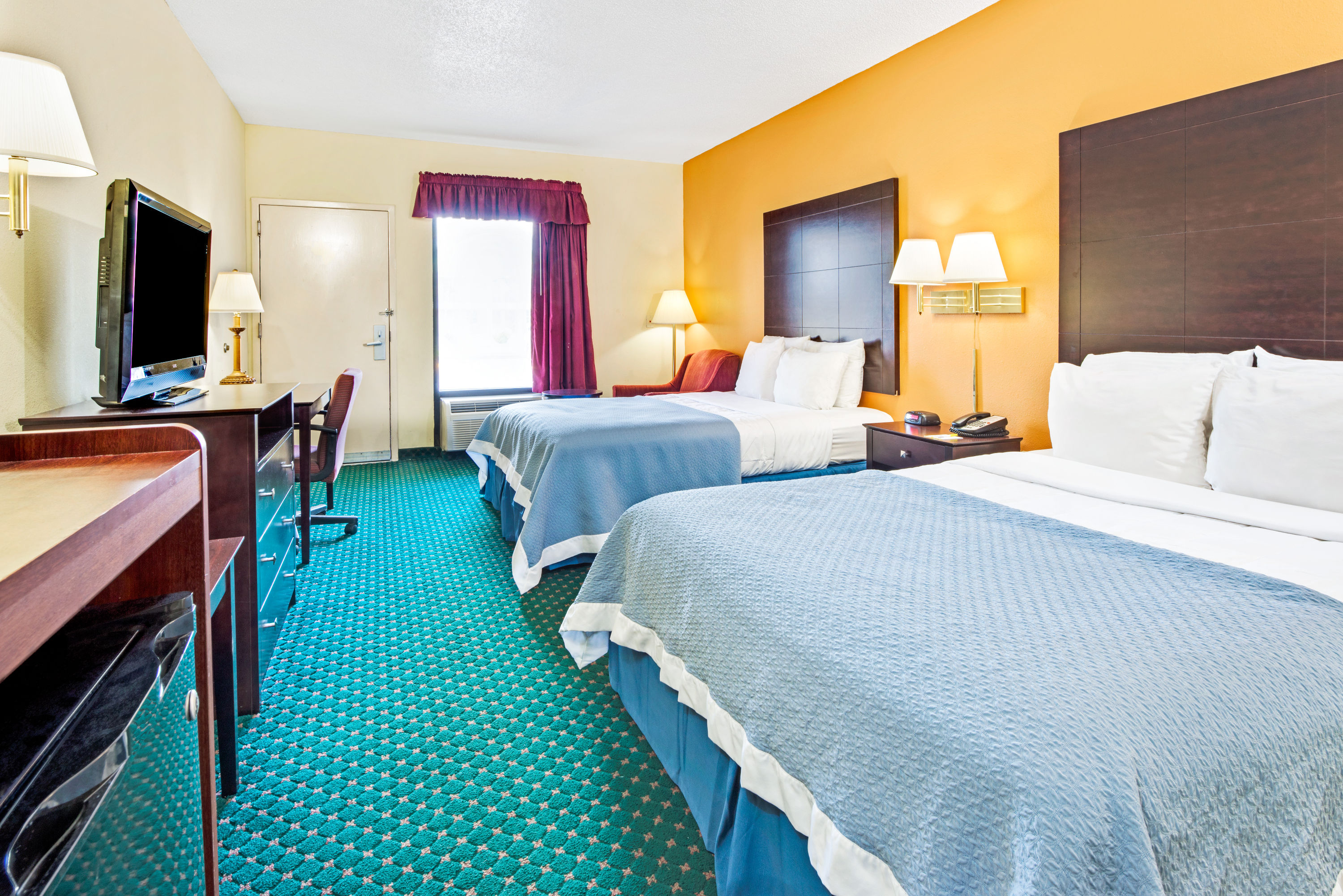 Guest room at the Days Inn by Wyndham Covington in Covington, Tennessee