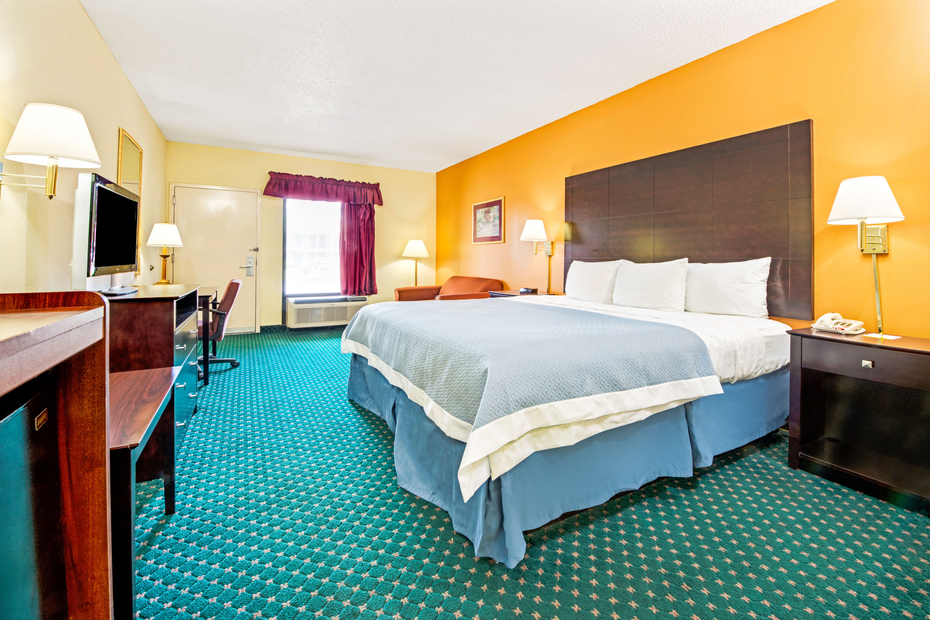 Guest room at the Days Inn by Wyndham Covington in Covington, Tennessee