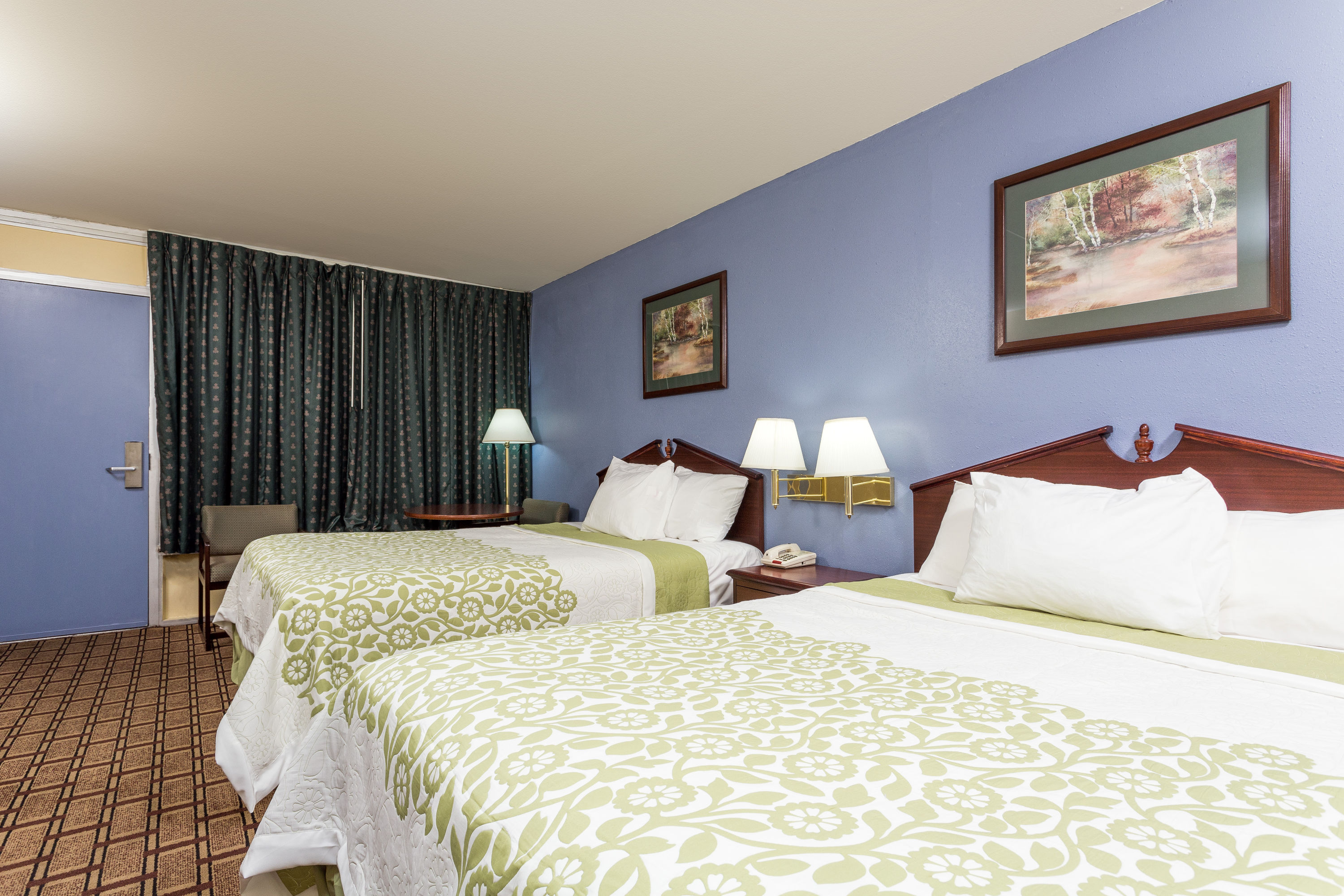 Guest room at the Days Inn by Wyndham Dickson in Dickson, Tennessee