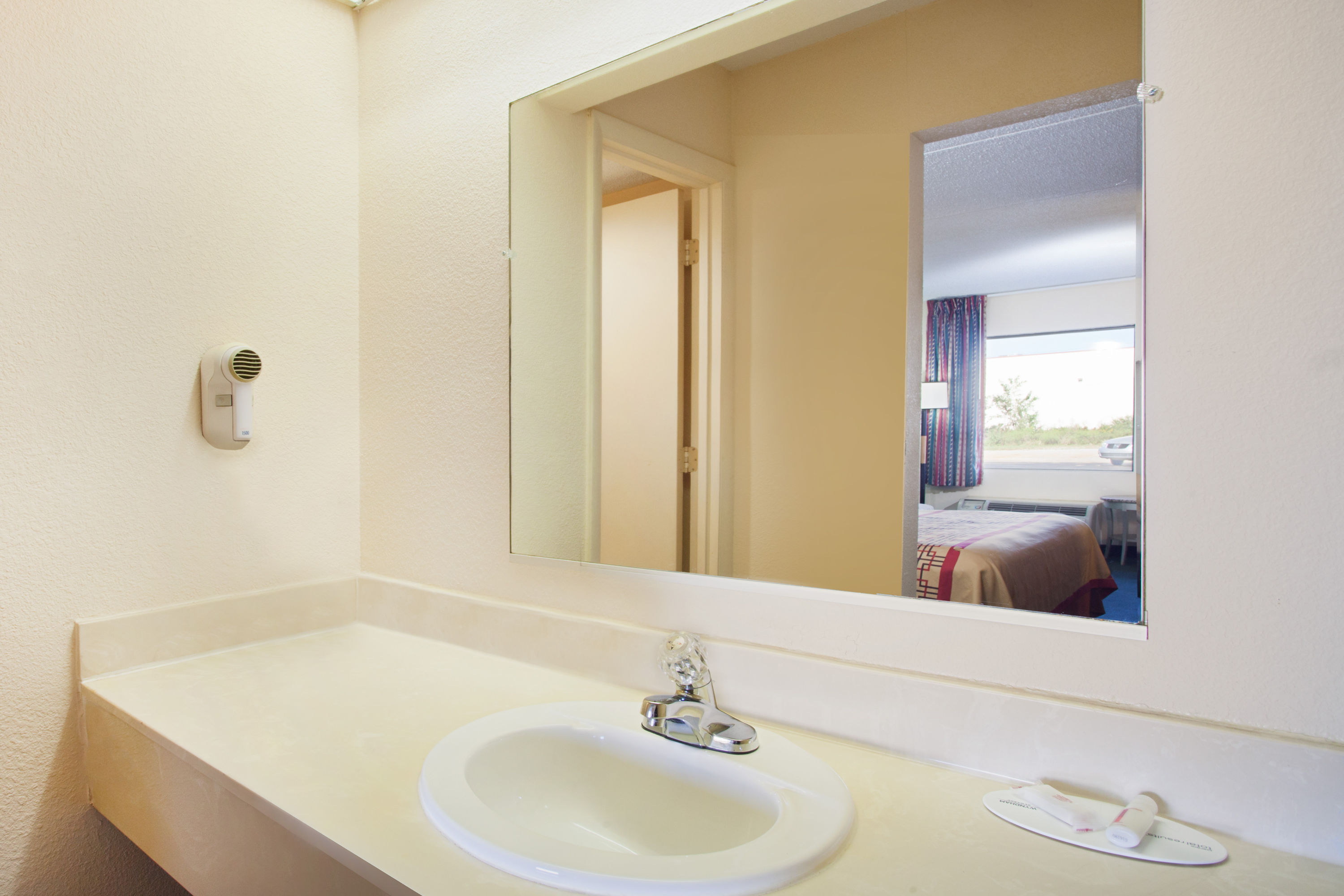 Guest room bath at the Days Inn by Wyndham Greeneville in Greeneville, Tennessee