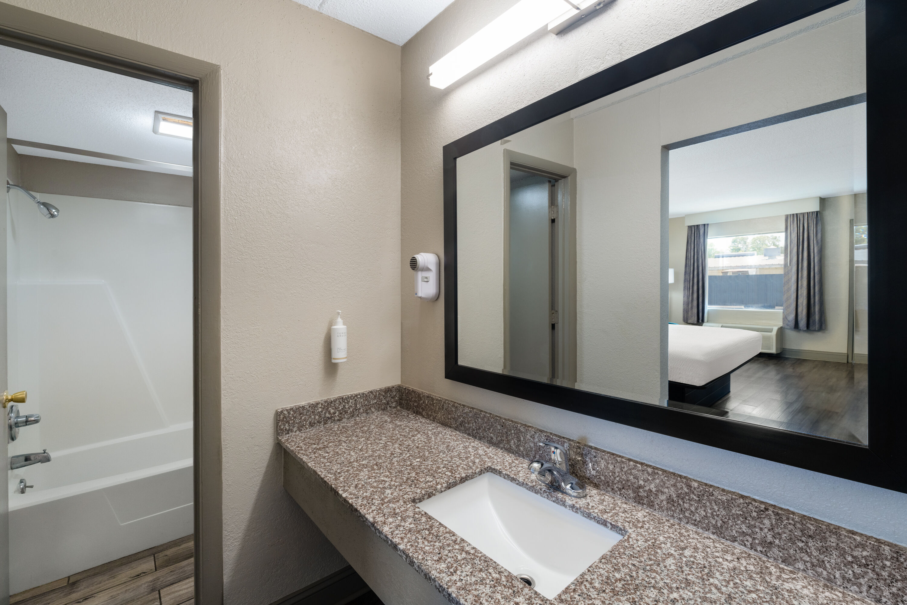 Guest room bath at the Days Inn by Wyndham Greeneville in Greeneville, Tennessee