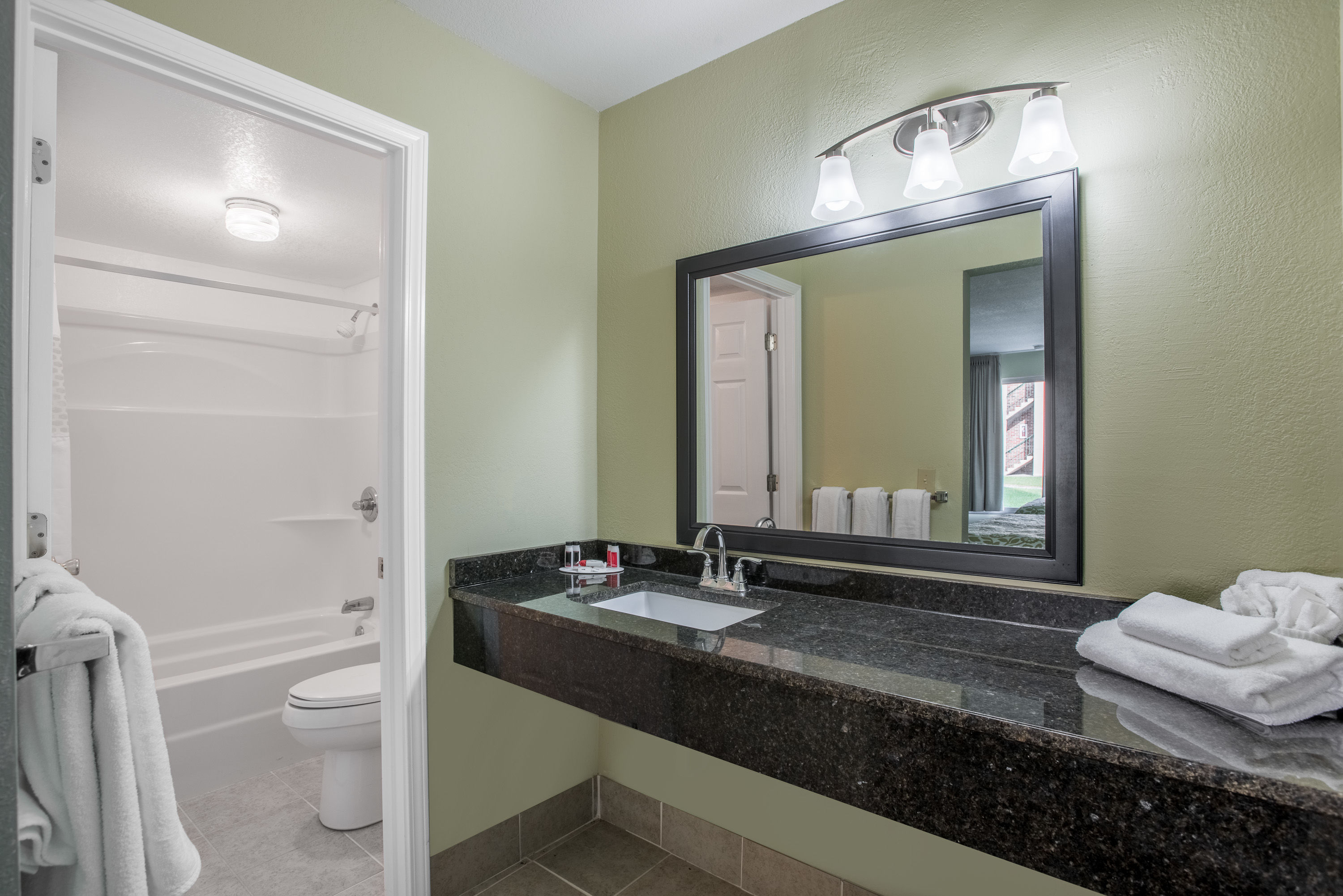 Guest room bath at the Days Inn by Wyndham Jellico - Tennessee State Line in Jellico, Tennessee