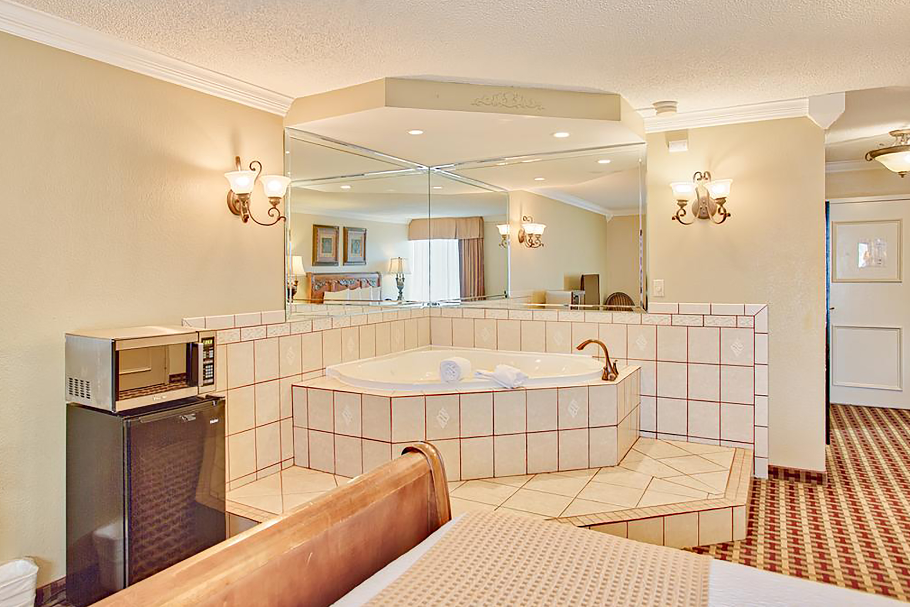 Guest room at the Days Inn & Suites by Wyndham Johnson City in Johnson City, Tennessee