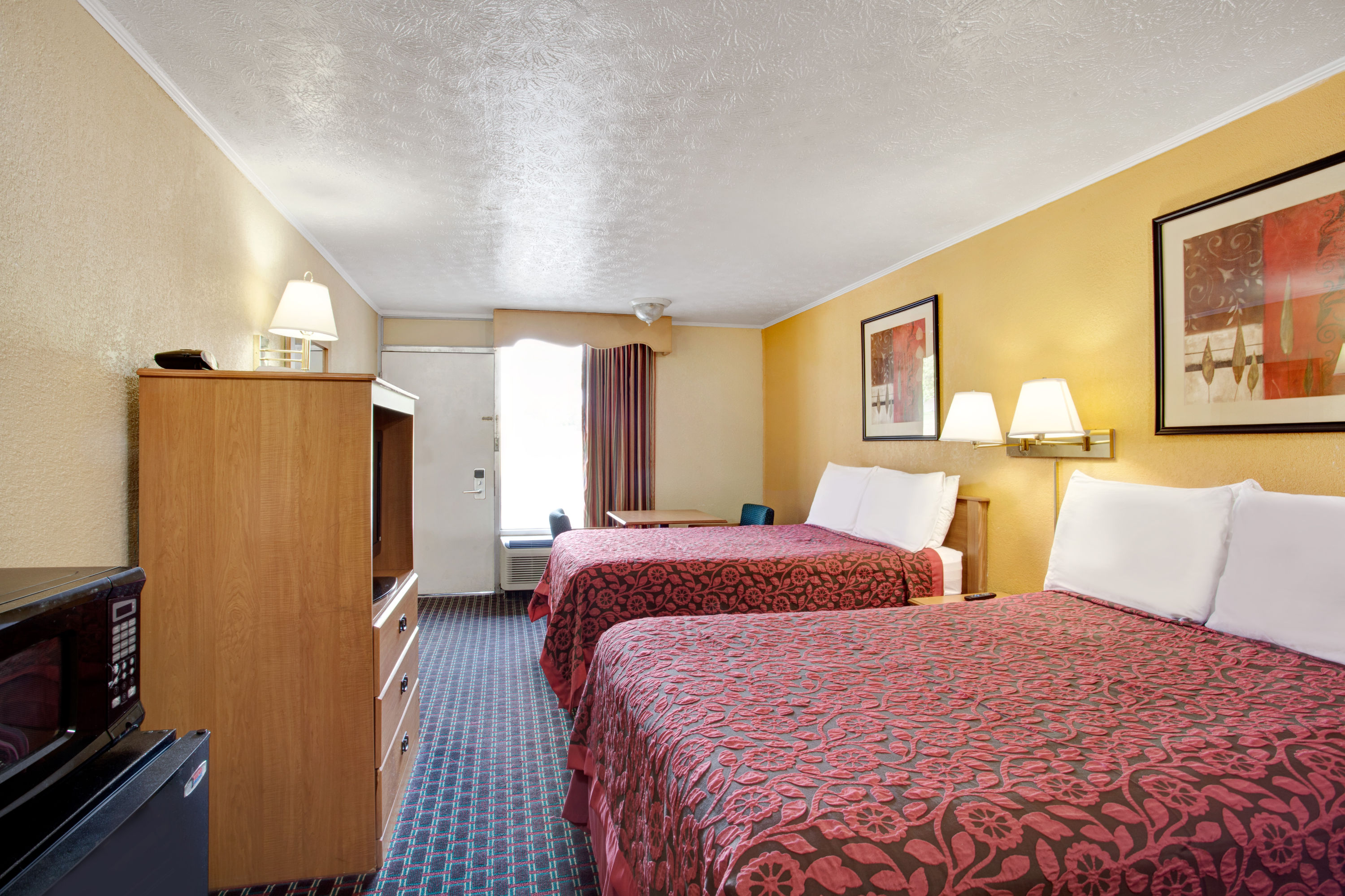 Guest room at the Days Inn by Wyndham Knoxville West in Knoxville, Tennessee