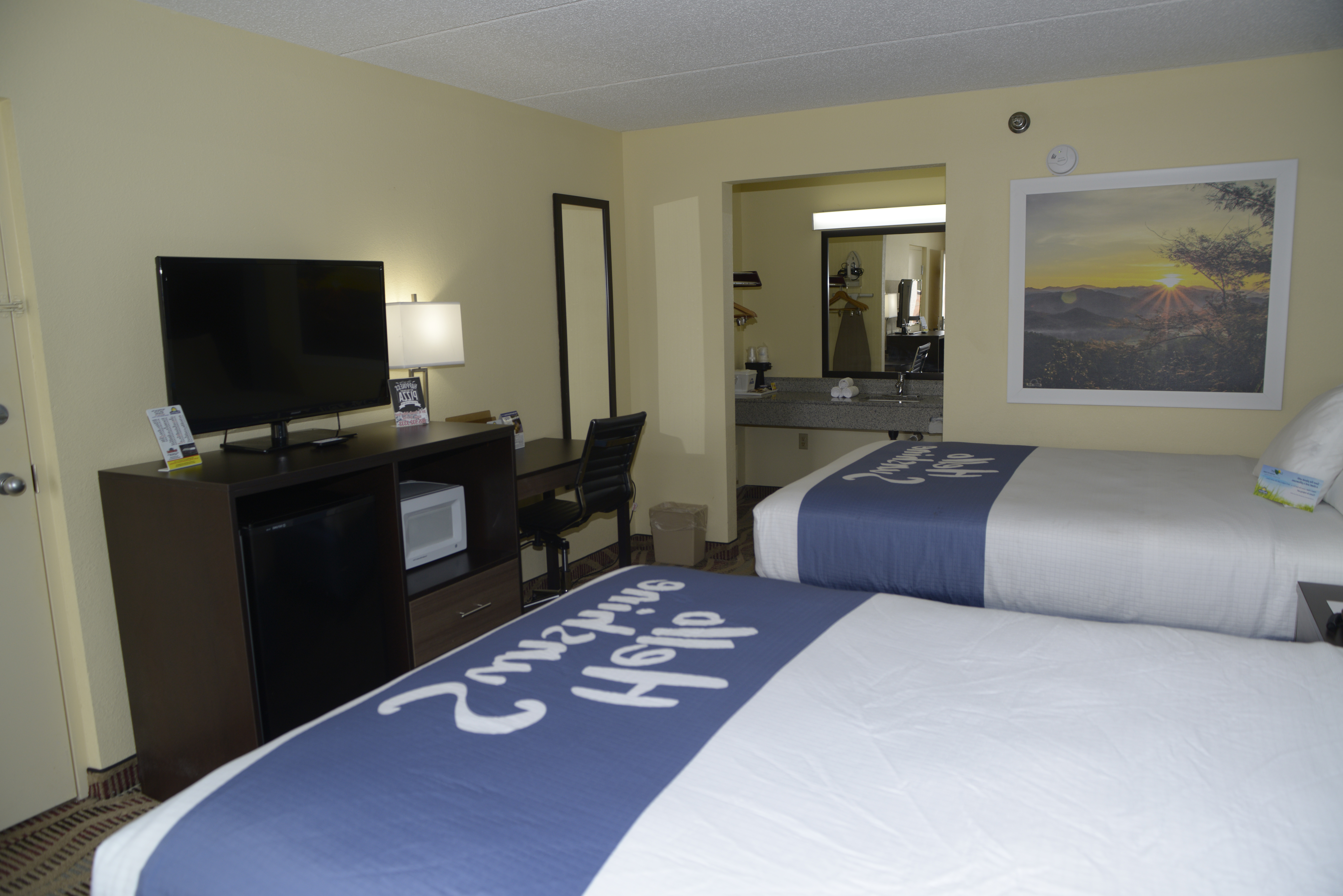 Guest room at the Days Inn by Wyndham Kodak/Sevierville Interstate Smokey Moun in Kodak, Tennessee