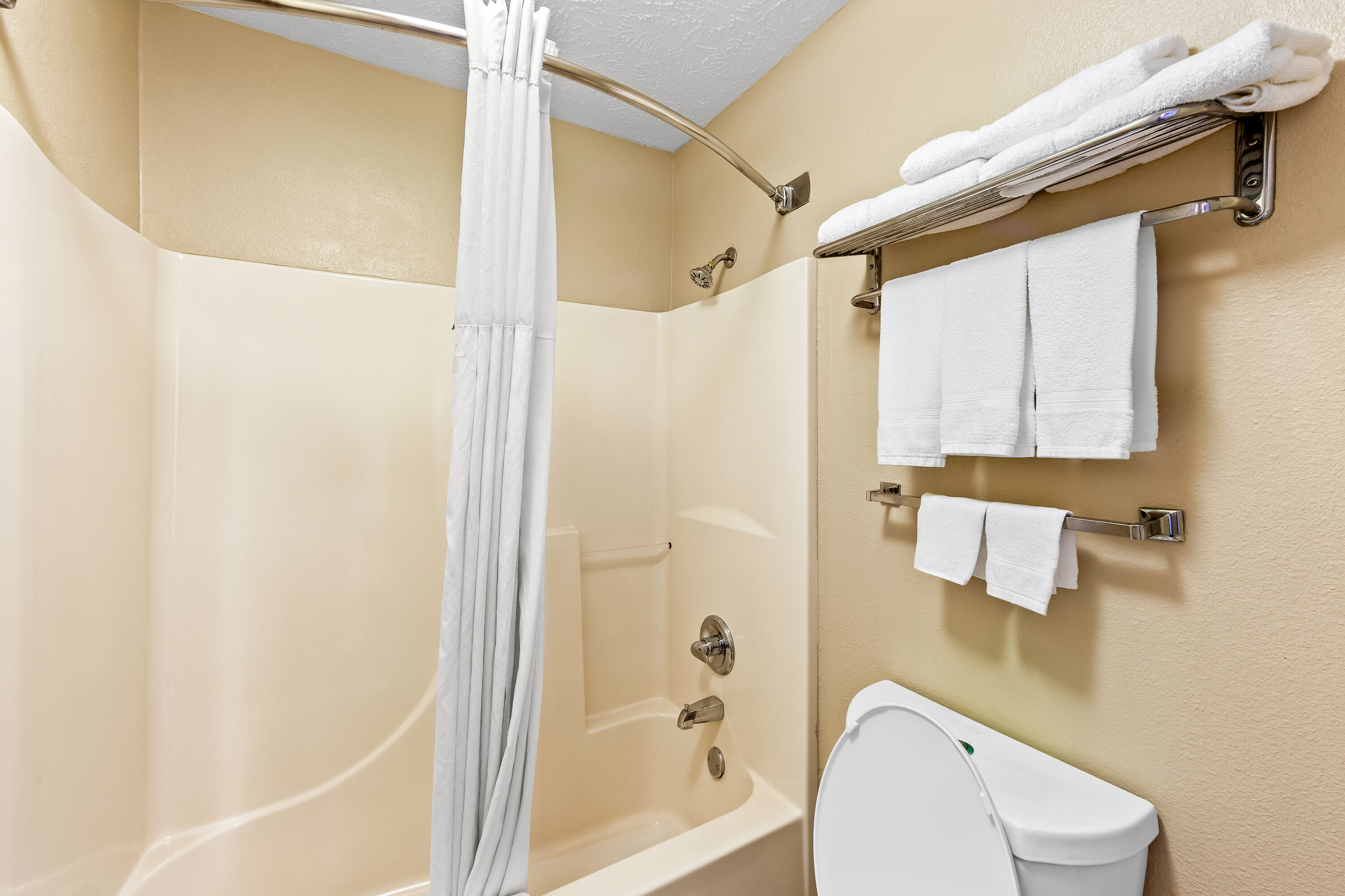 Guest room bath at the Days Inn by Wyndham Lexington in Lexington, Tennessee