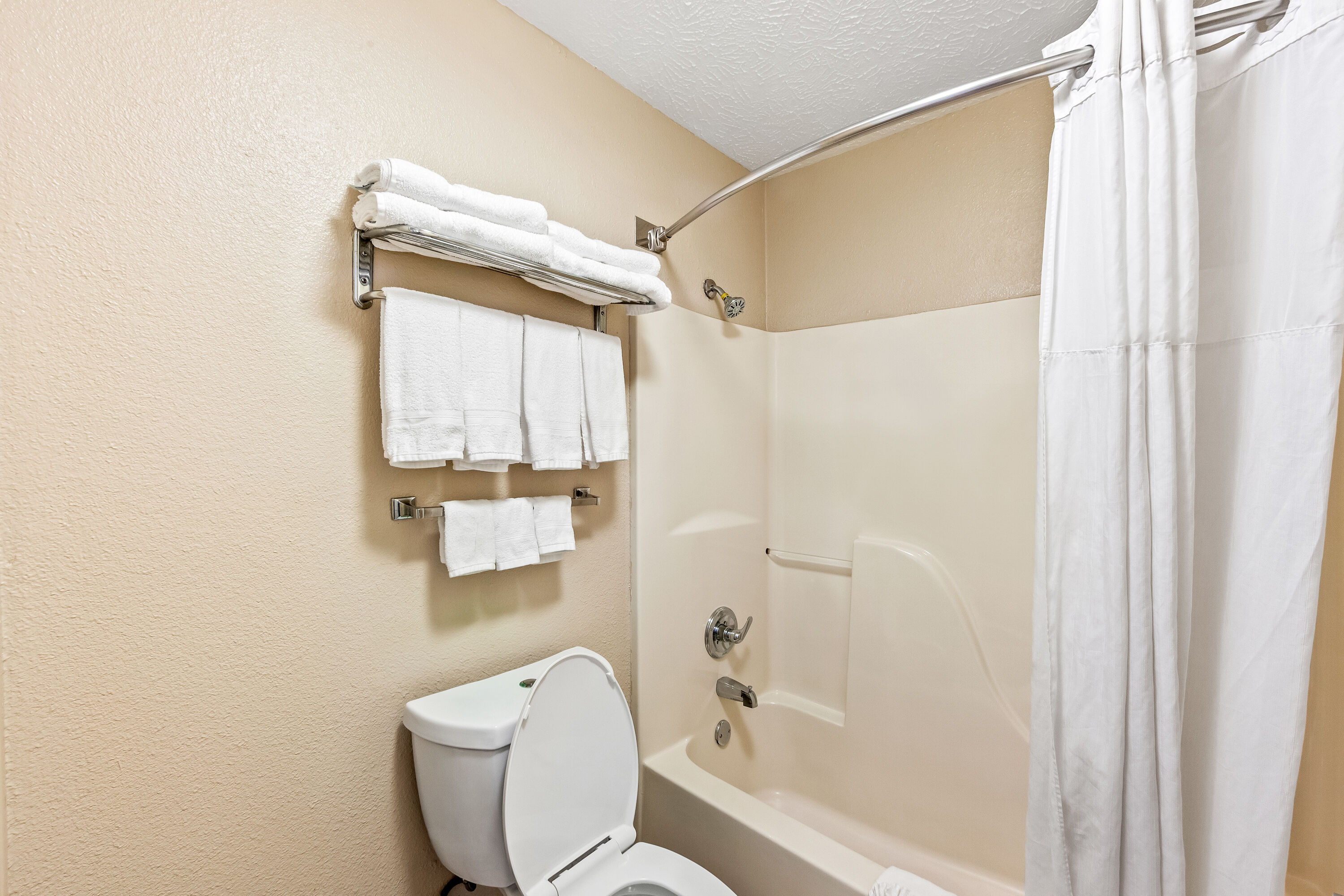 Guest room bath at the Days Inn by Wyndham Lexington in Lexington, Tennessee