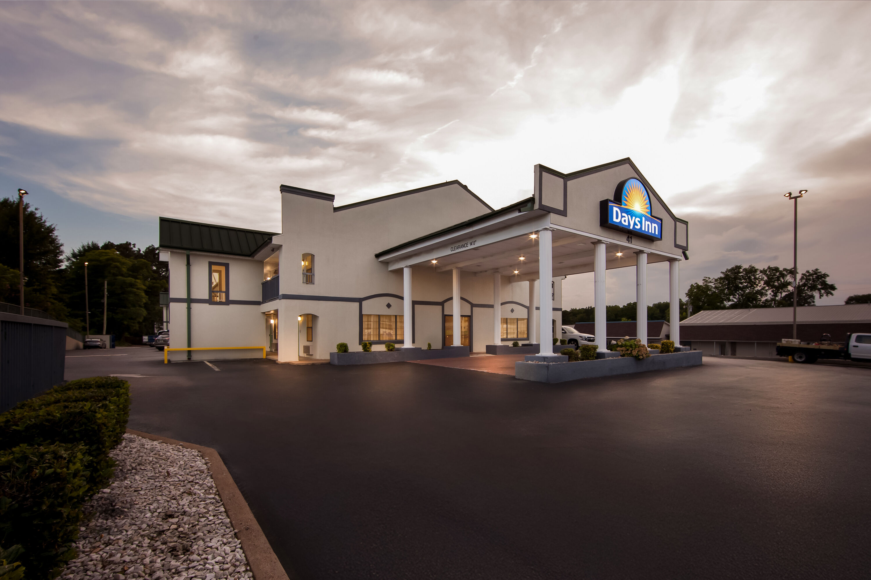 Exterior Night Image of Days Inn by Wyndham Lexington hotel in Lexington, Tennessee