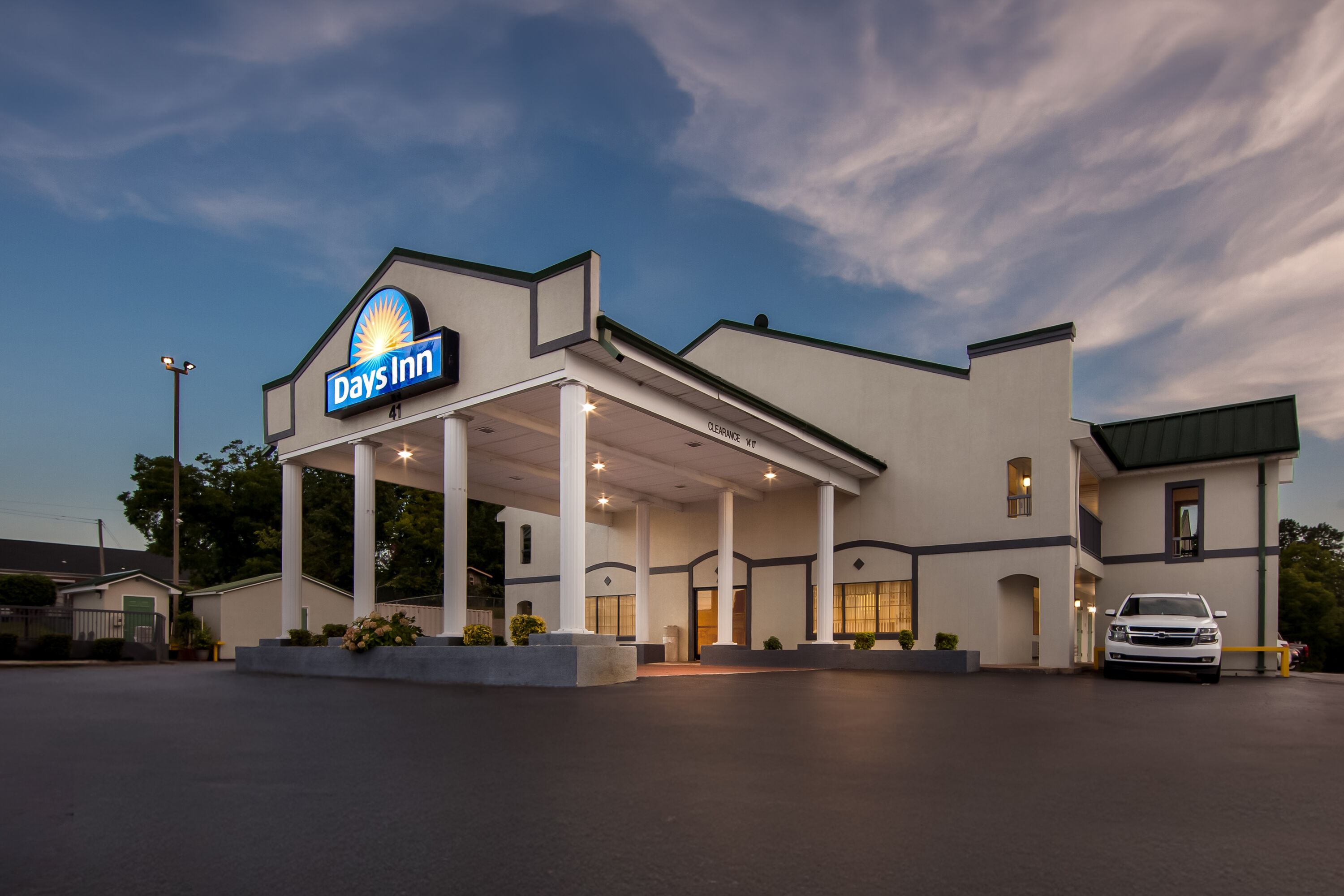 Exterior Night Image of Days Inn by Wyndham Lexington hotel in Lexington, Tennessee