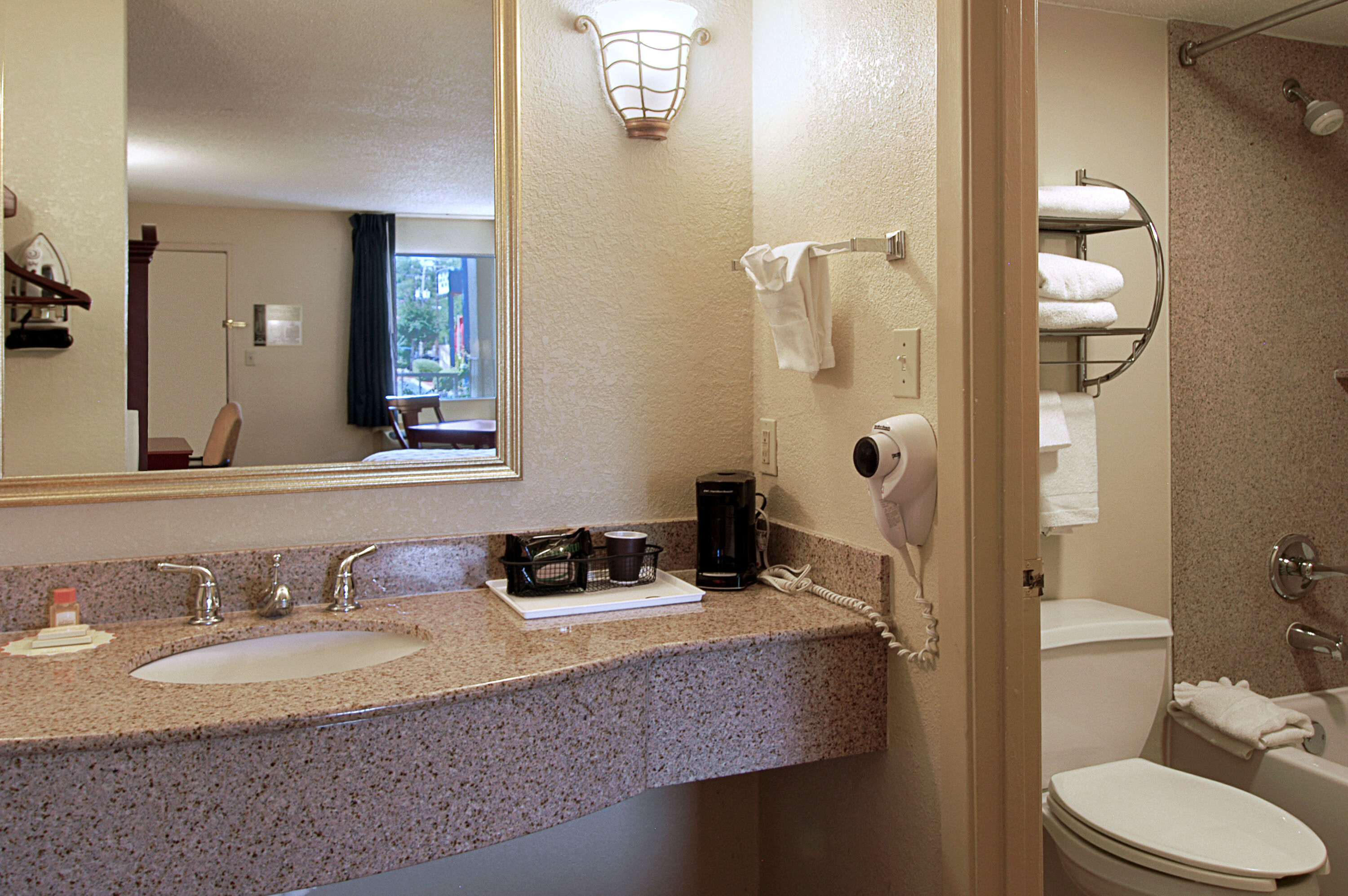 Guest room bath at the Days Inn by Wyndham Memphis at Graceland in Memphis, Tennessee