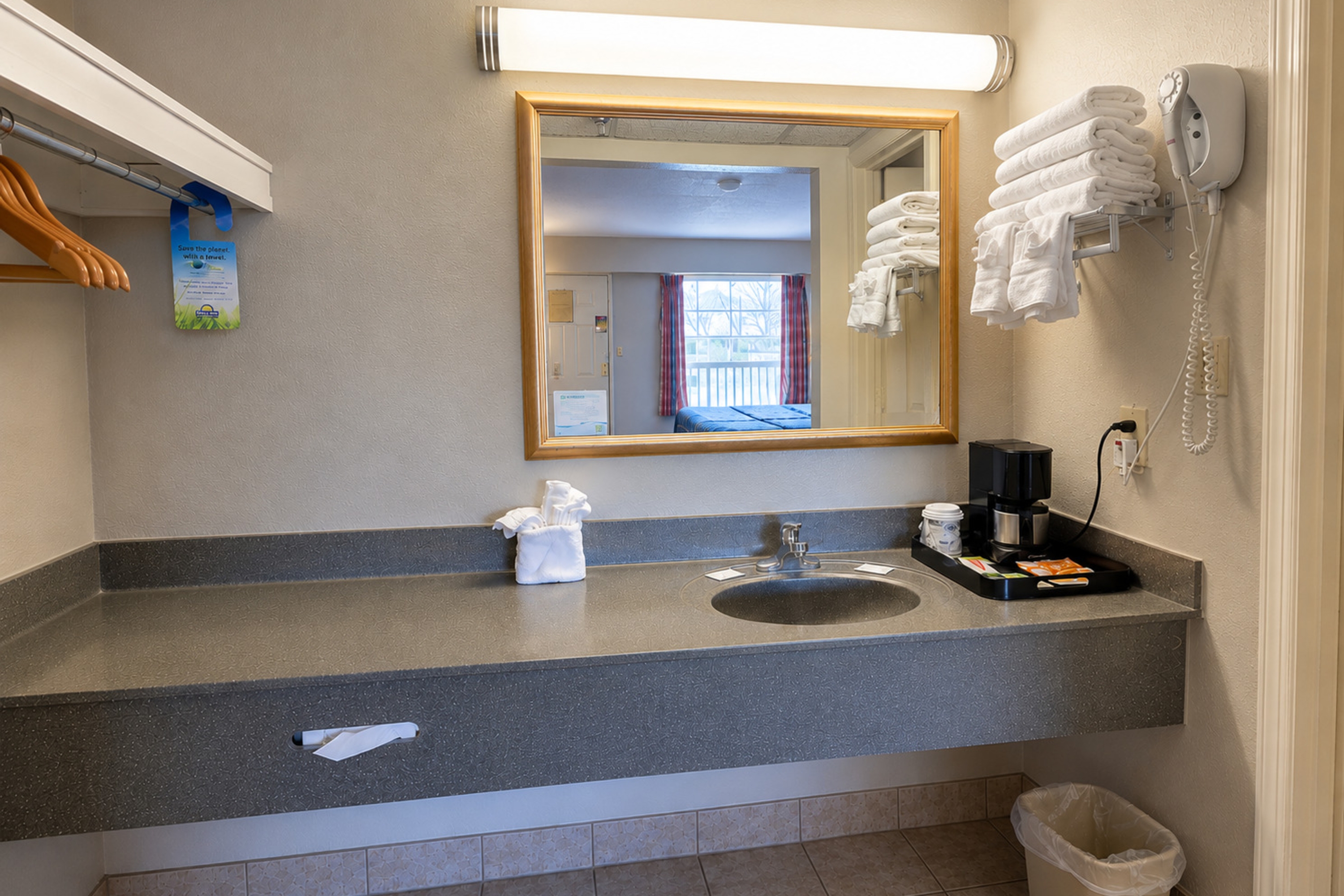 Guest room bath at the Days Inn by Wyndham Apple Valley Pigeon Forge/Sevierville in Sevierville, Tennessee