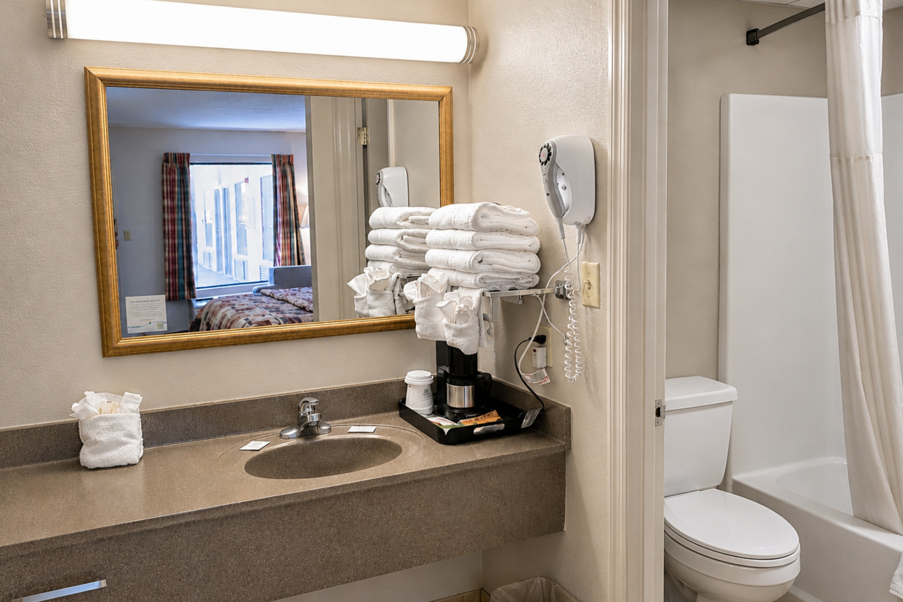 Guest room bath at the Days Inn by Wyndham Apple Valley Pigeon Forge/Sevierville in Sevierville, Tennessee