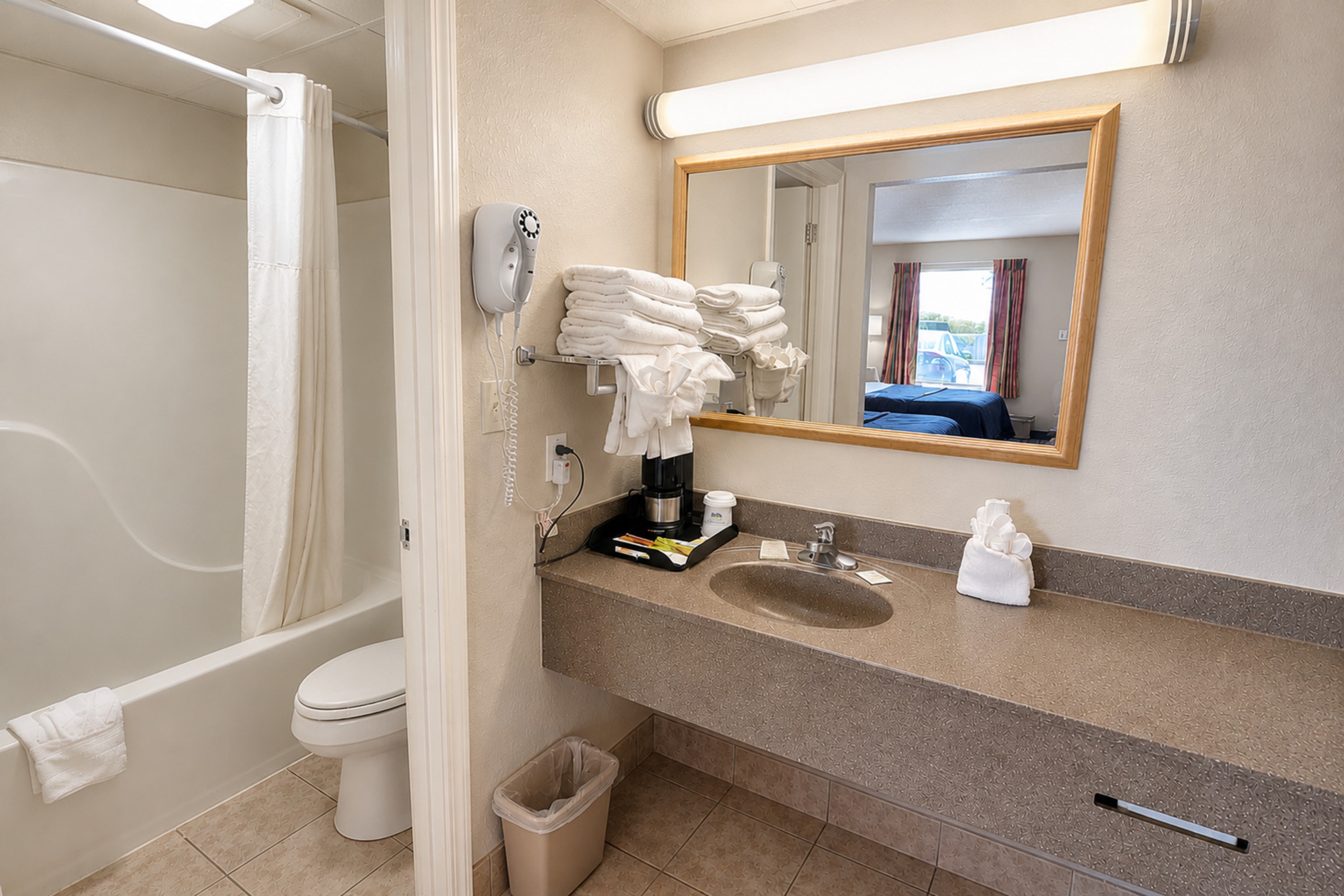 Guest room bath at the Days Inn by Wyndham Apple Valley Pigeon Forge/Sevierville in Sevierville, Tennessee
