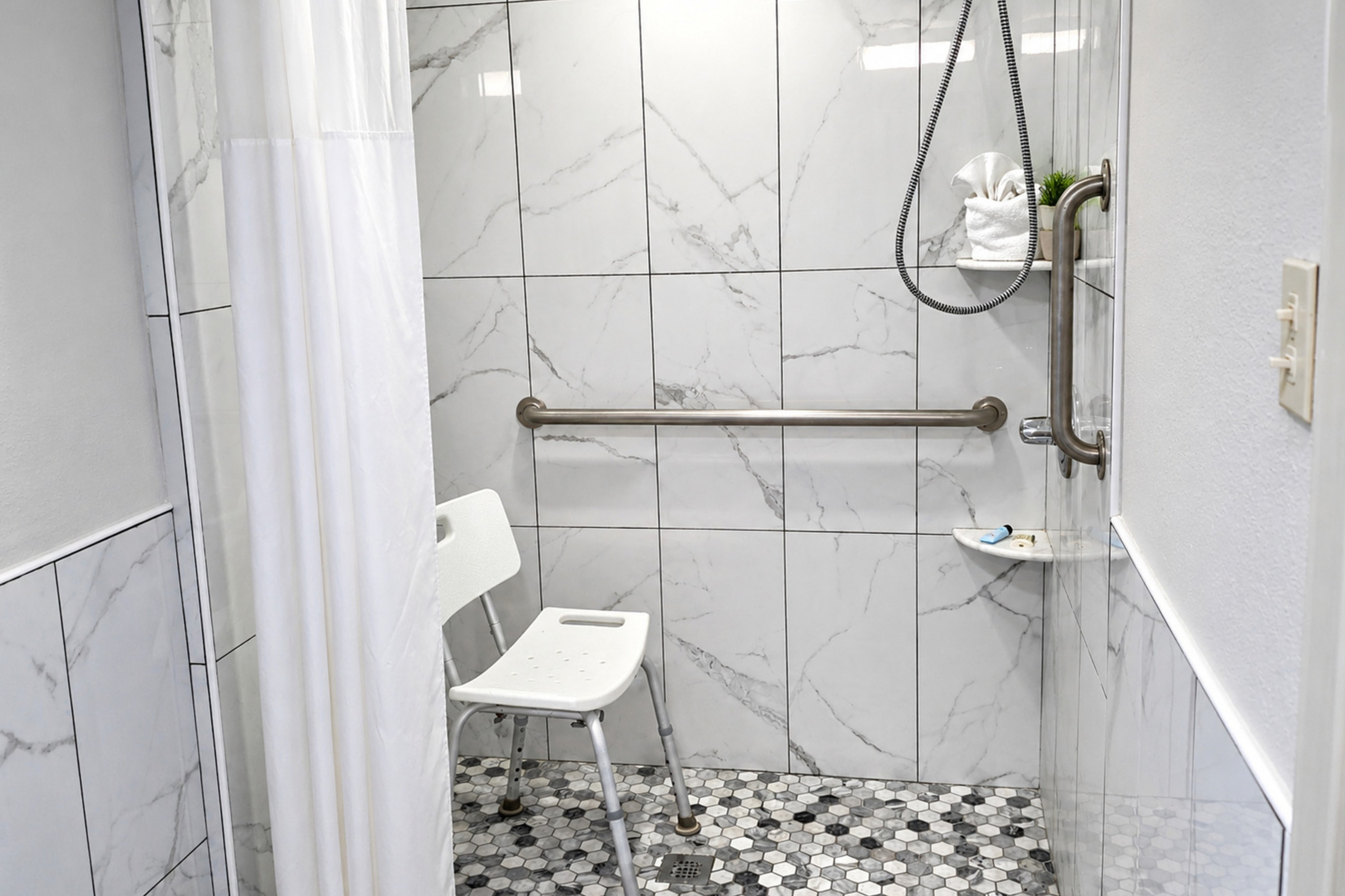 Guest room bath at the Days Inn by Wyndham Apple Valley Pigeon Forge/Sevierville in Sevierville, Tennessee