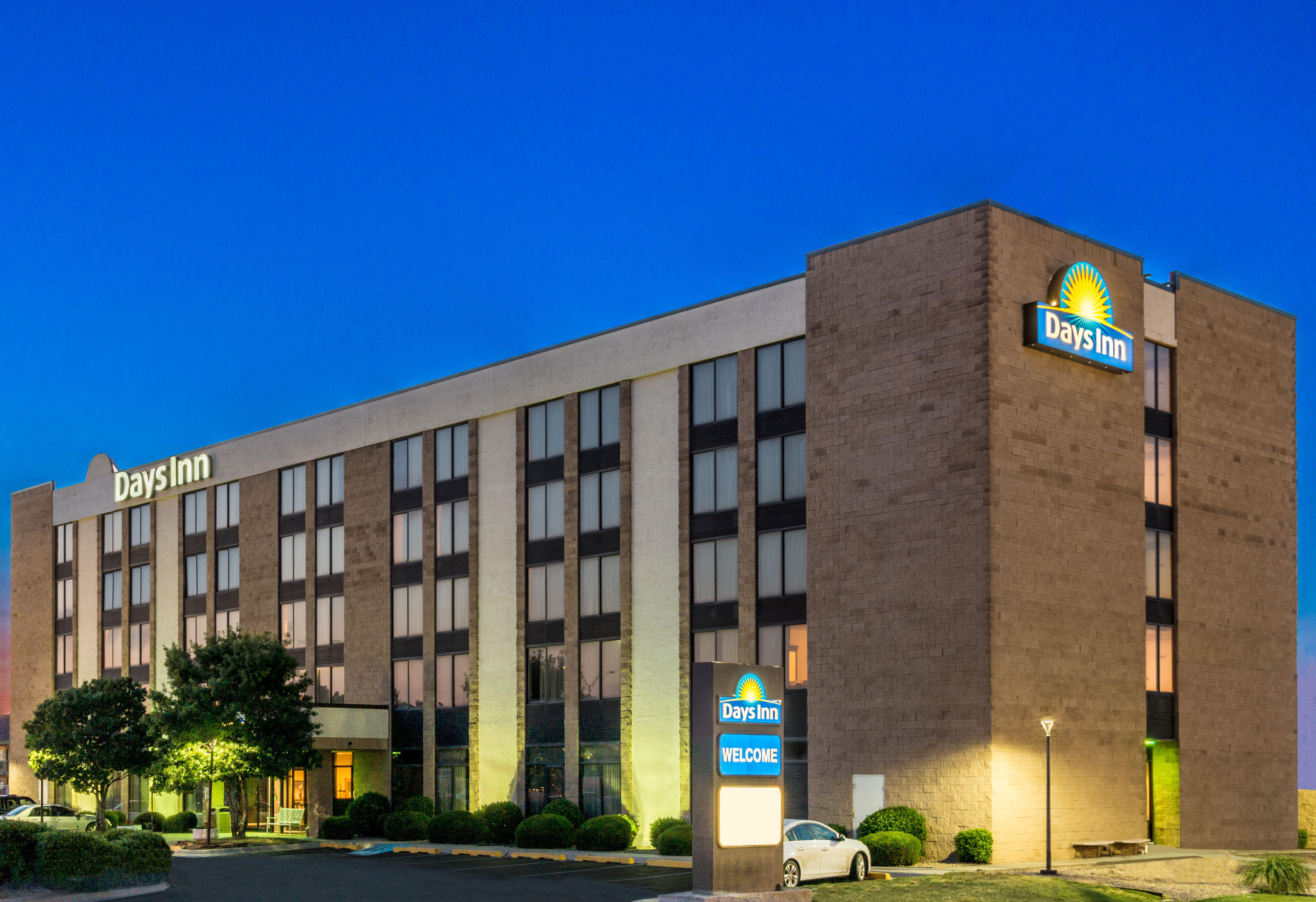 Exterior Dusk Image of Days Inn by Wyndham Amarillo East hotel in Amarillo, Texas