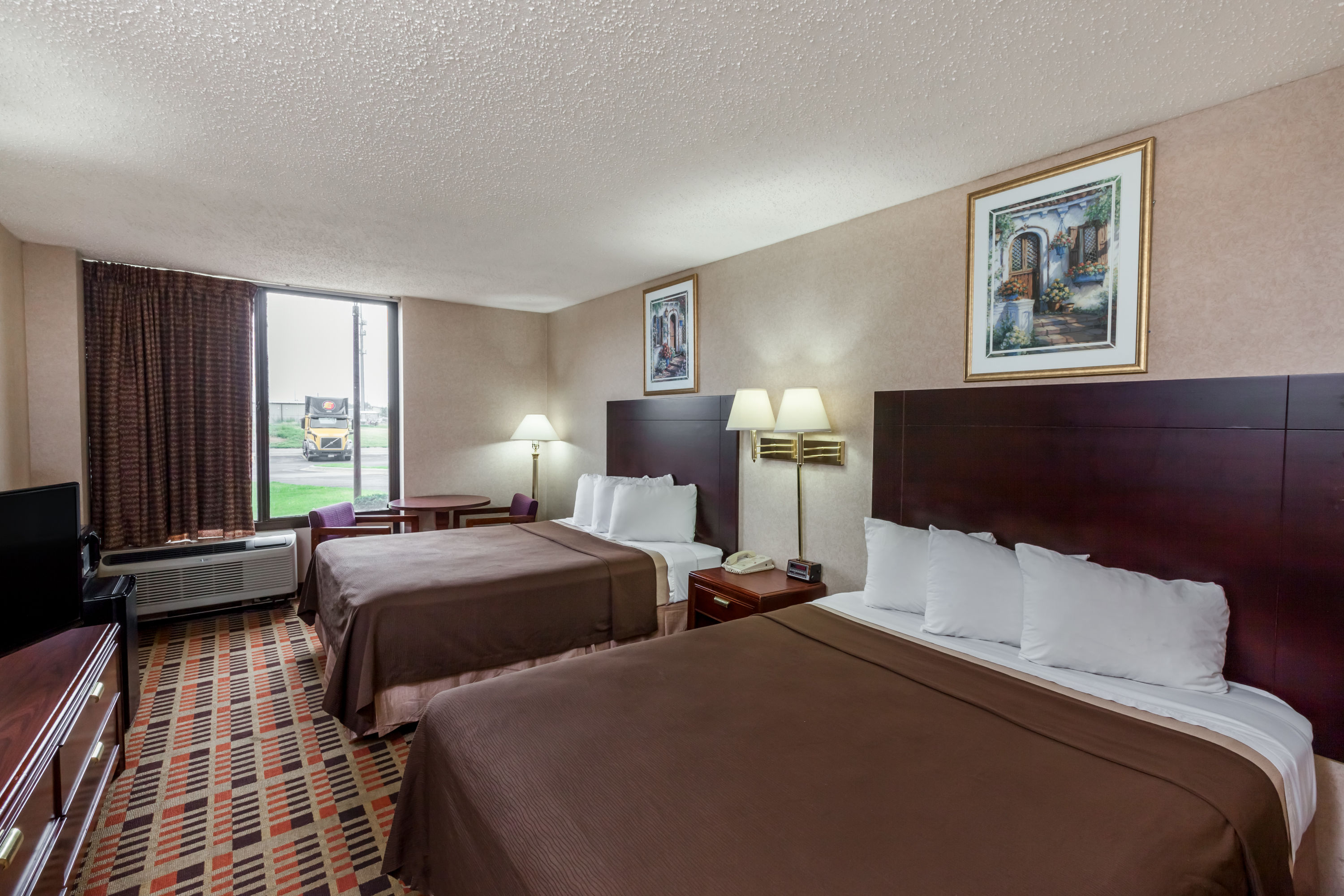Guest room at the Days Inn by Wyndham Amarillo East in Amarillo, Texas
