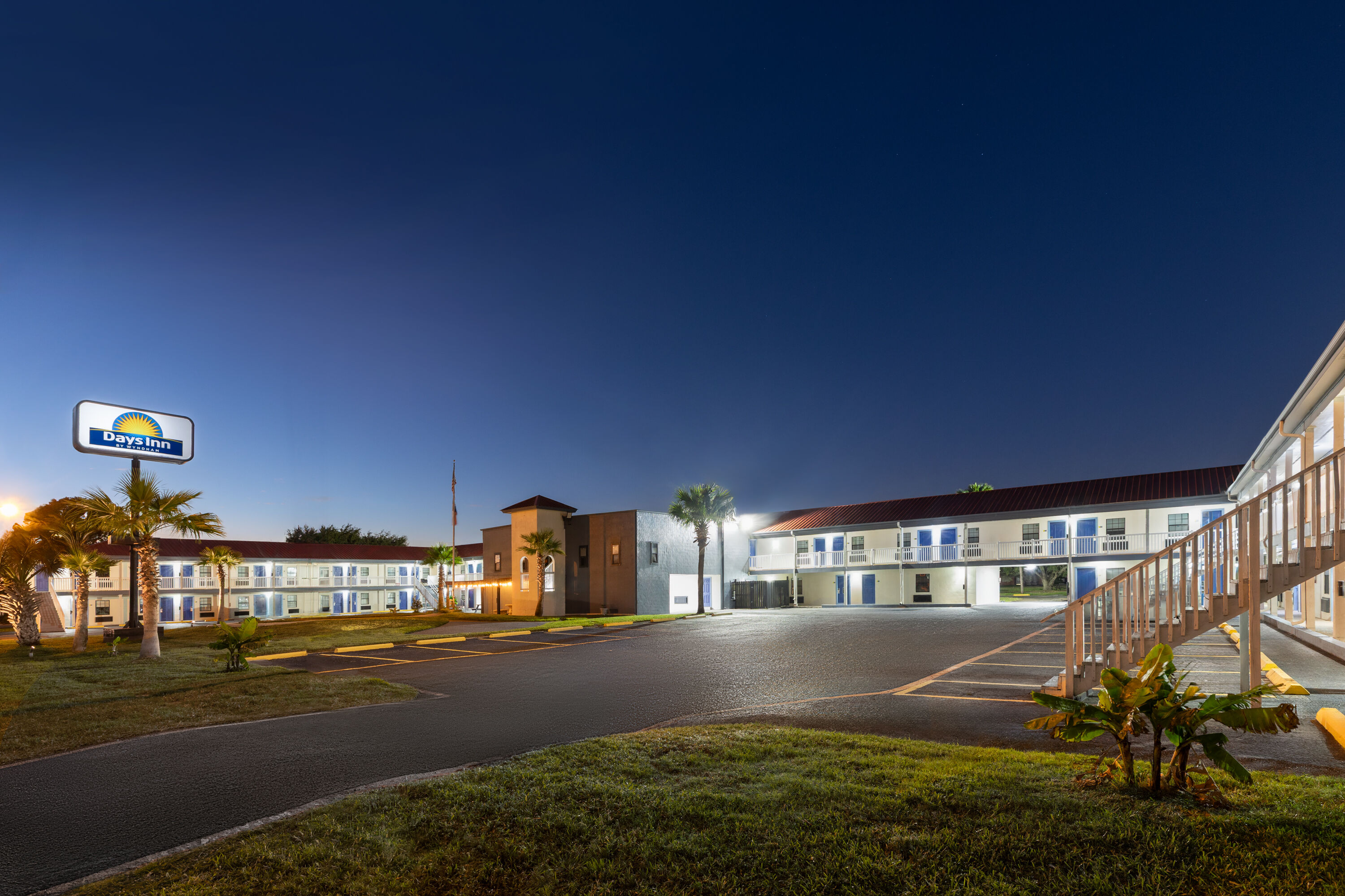 Exterior Dusk Image of Days Inn by Wyndham Aransas Pass hotel in Aransas Pass, Texas
