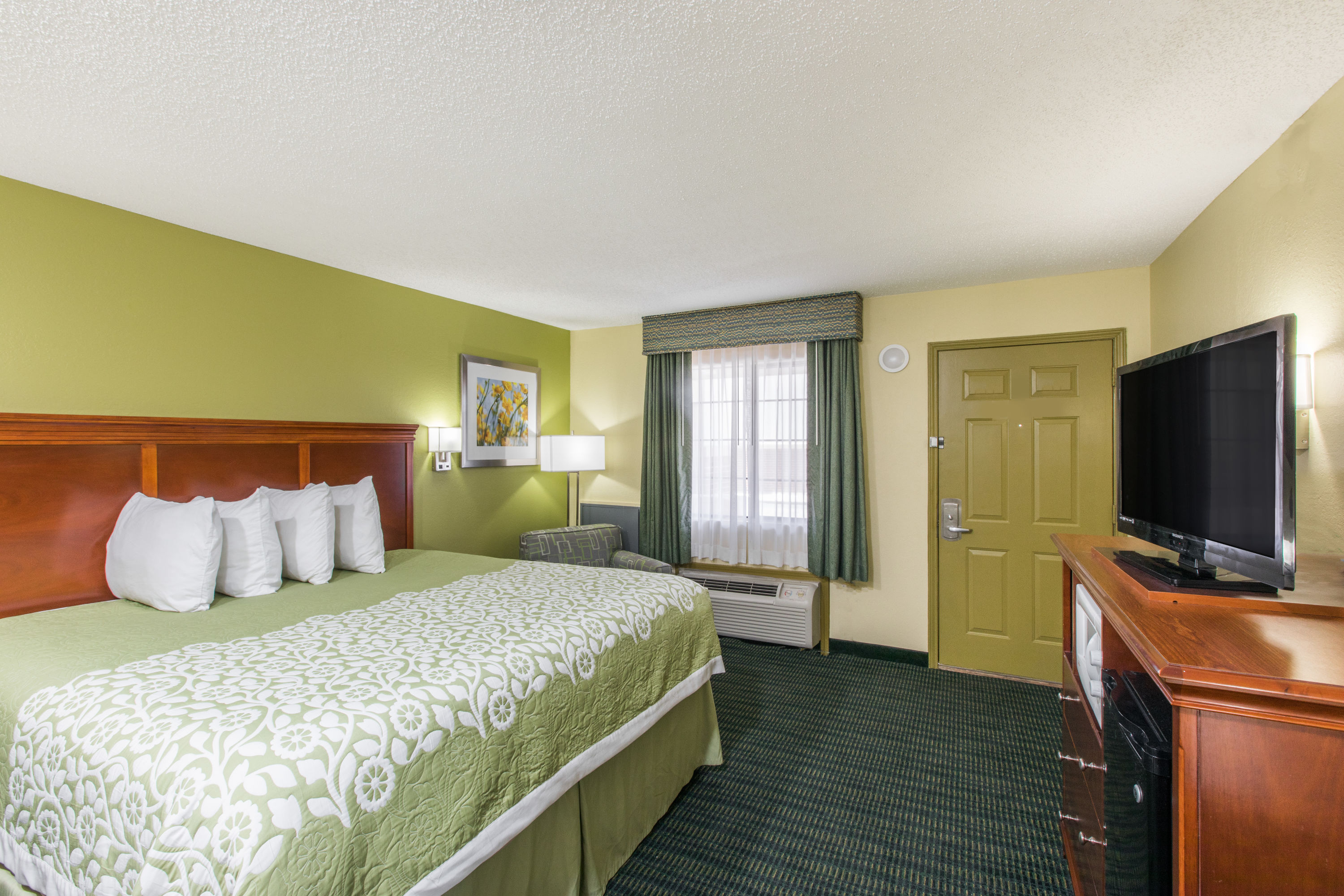 Guest room at the Days Inn & Suites by Wyndham Big Spring in Big Spring, Texas