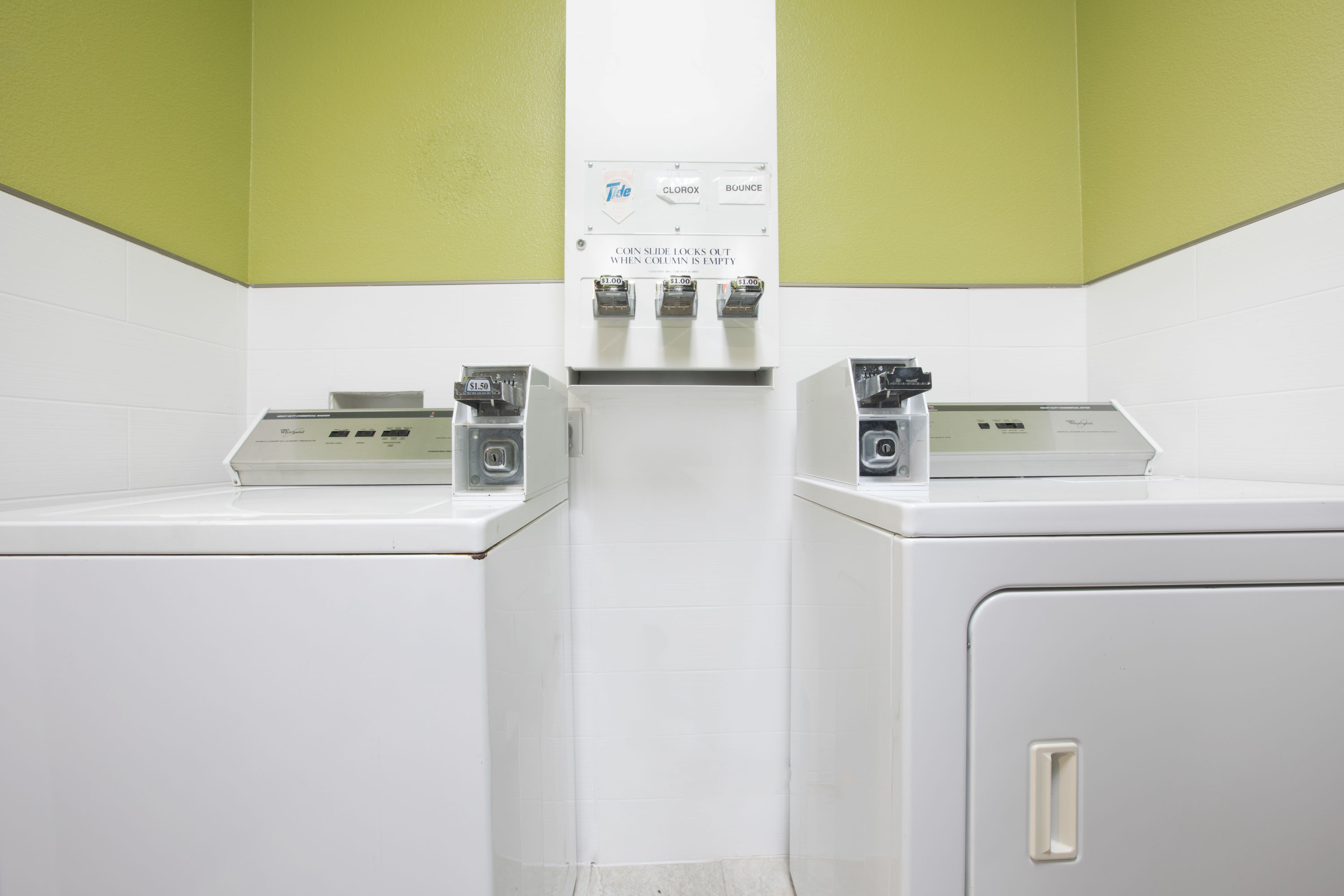 Laundry facilities at Days Inn & Suites by Wyndham Big Spring in Big Spring, Texas