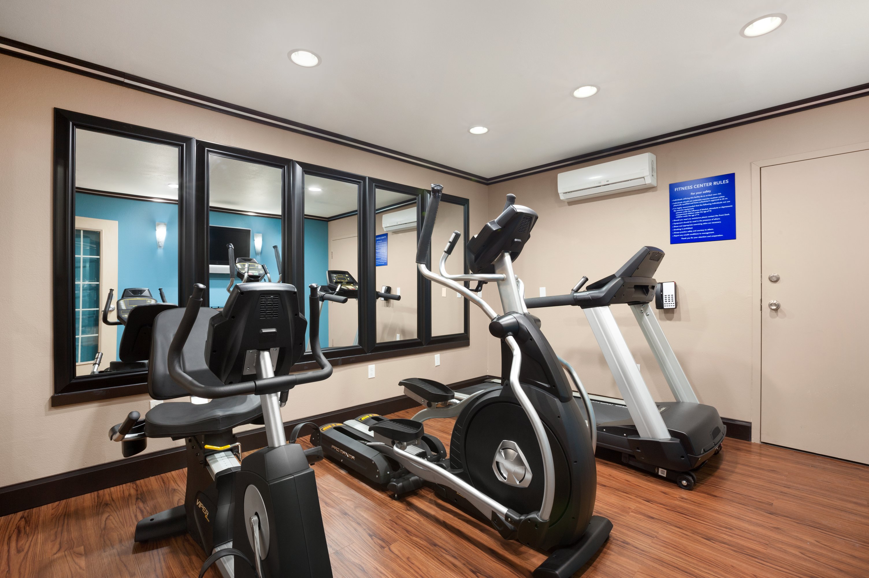 Fitness room at Days Inn & Suites by Wyndham Conroe North in Conroe, Texas