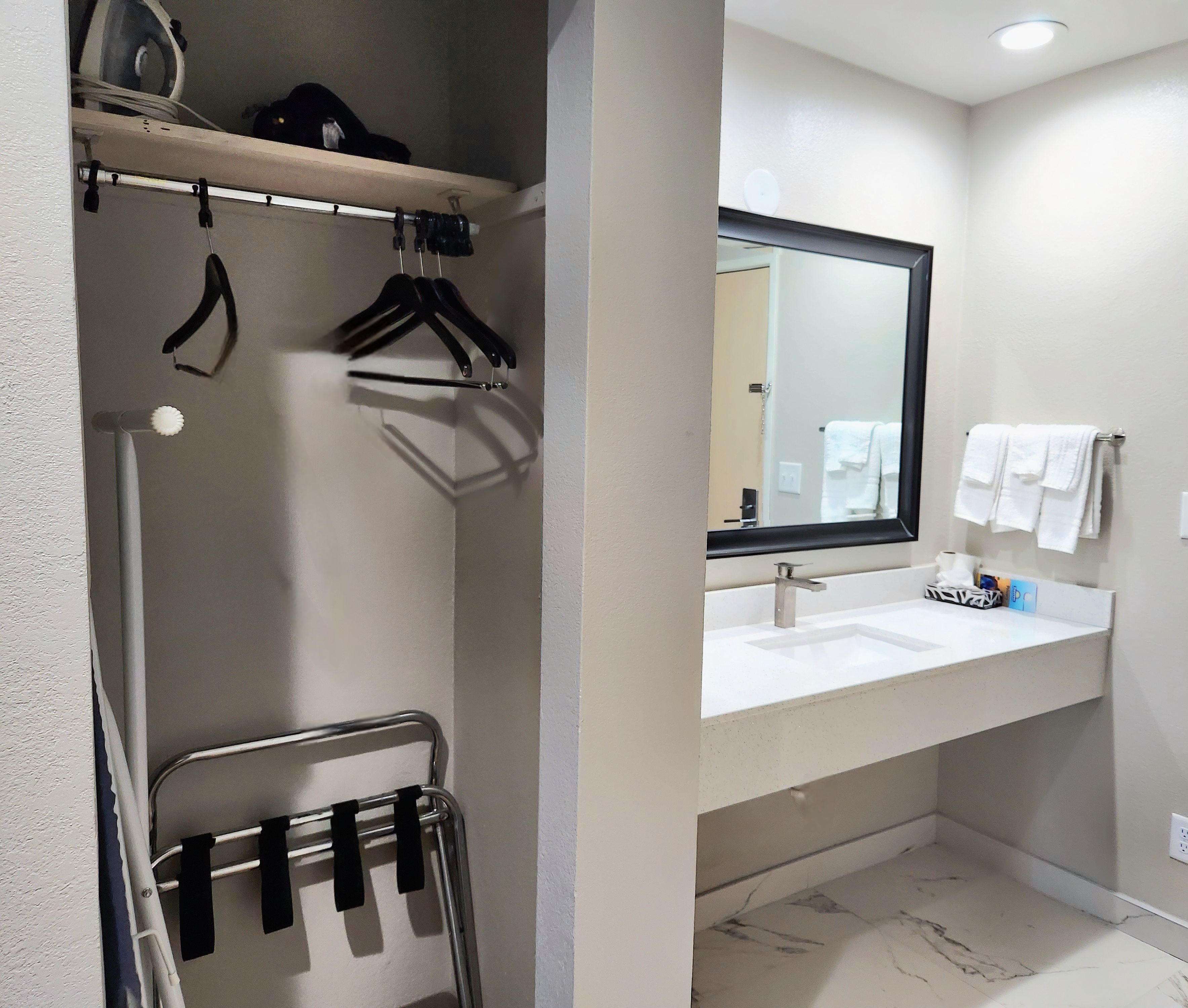 Guest room bath at the Days Inn & Suites by Wyndham Corpus Christi Central in Corpus Christi, Texas