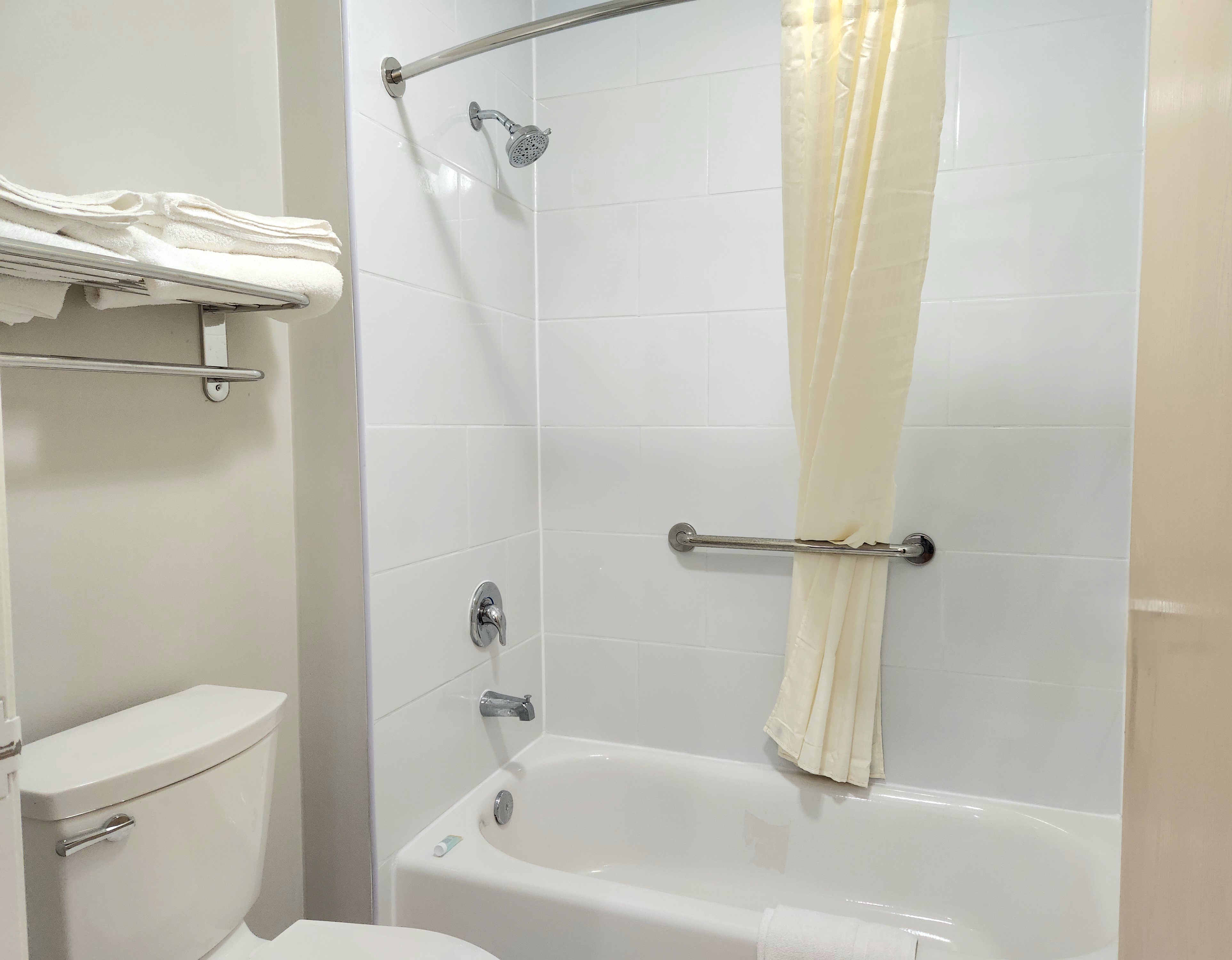 Guest room bath at the Days Inn & Suites by Wyndham Corpus Christi Central in Corpus Christi, Texas