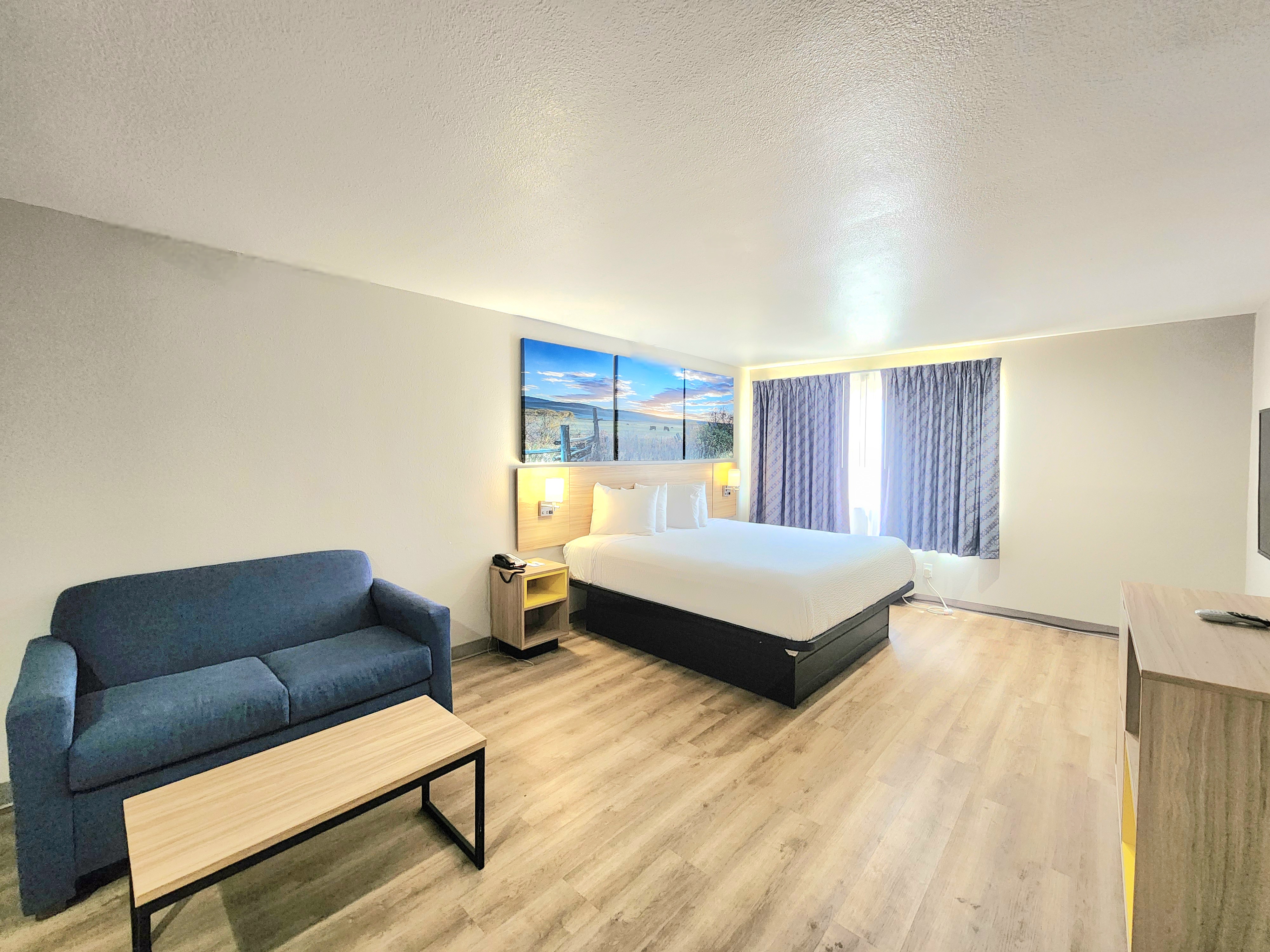 Guest room at the Days Inn & Suites by Wyndham Corpus Christi Central in Corpus Christi, Texas