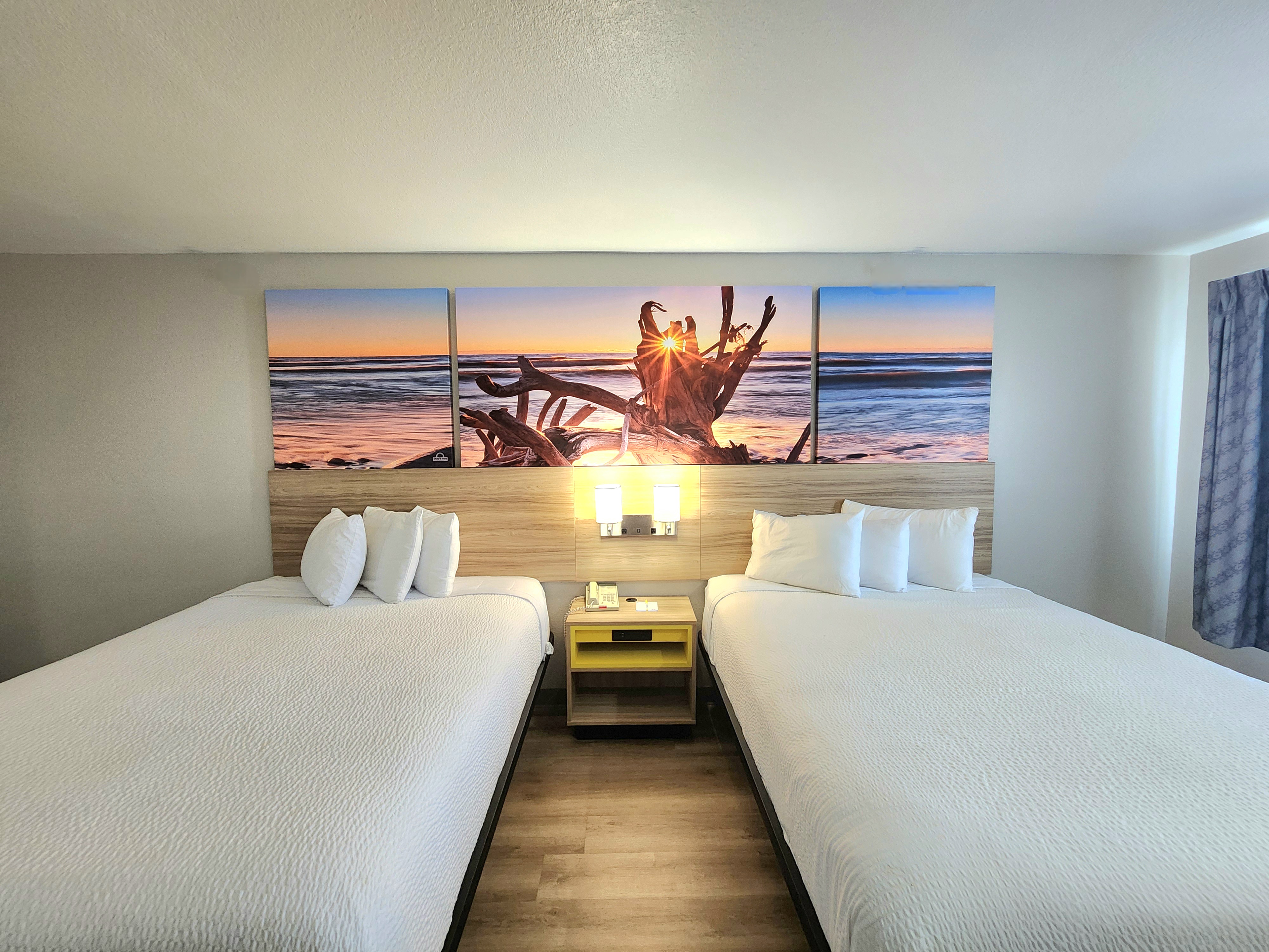Guest room at the Days Inn & Suites by Wyndham Corpus Christi Central in Corpus Christi, Texas