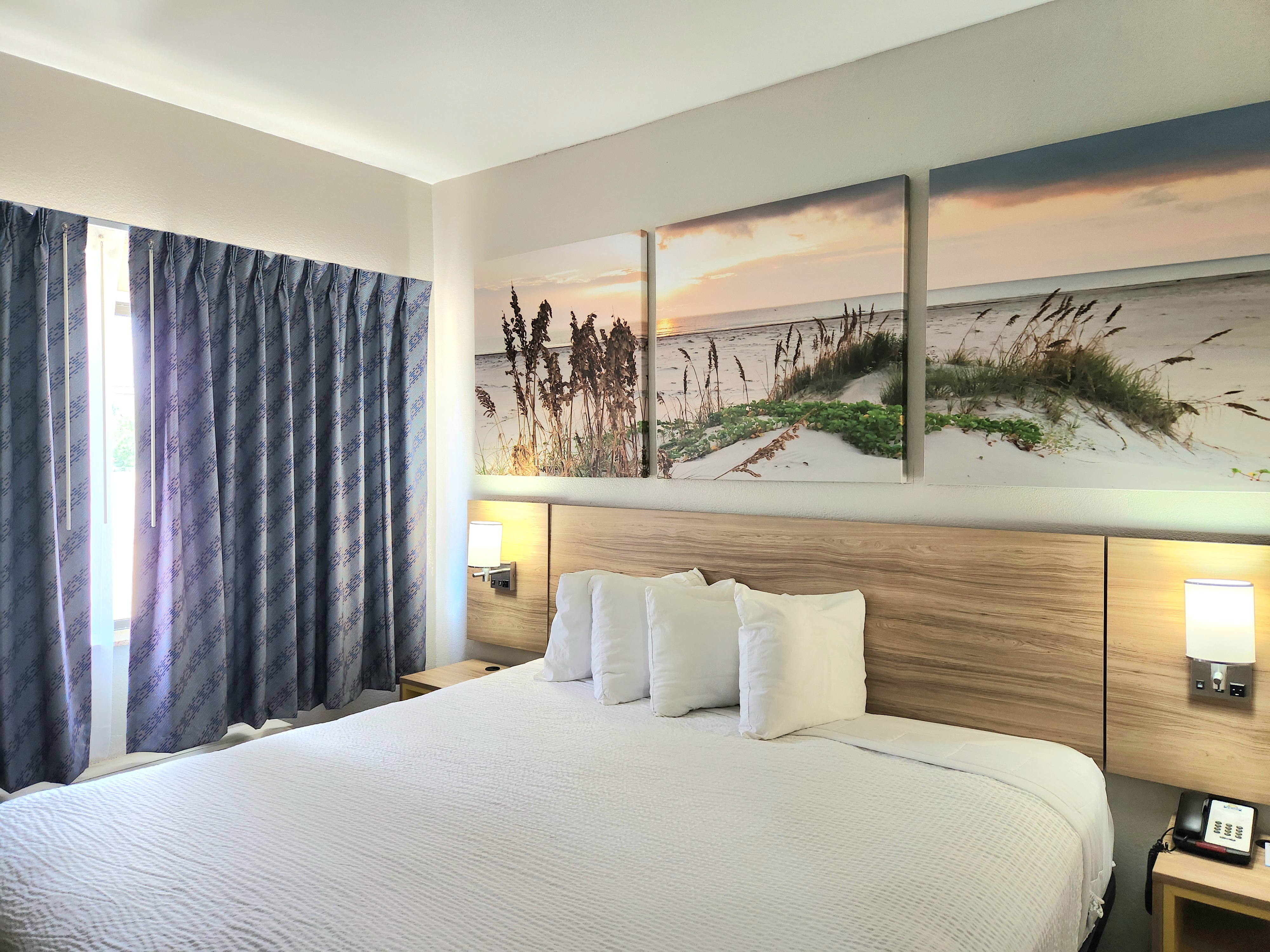 Guest room at the Days Inn & Suites by Wyndham Corpus Christi Central in Corpus Christi, Texas