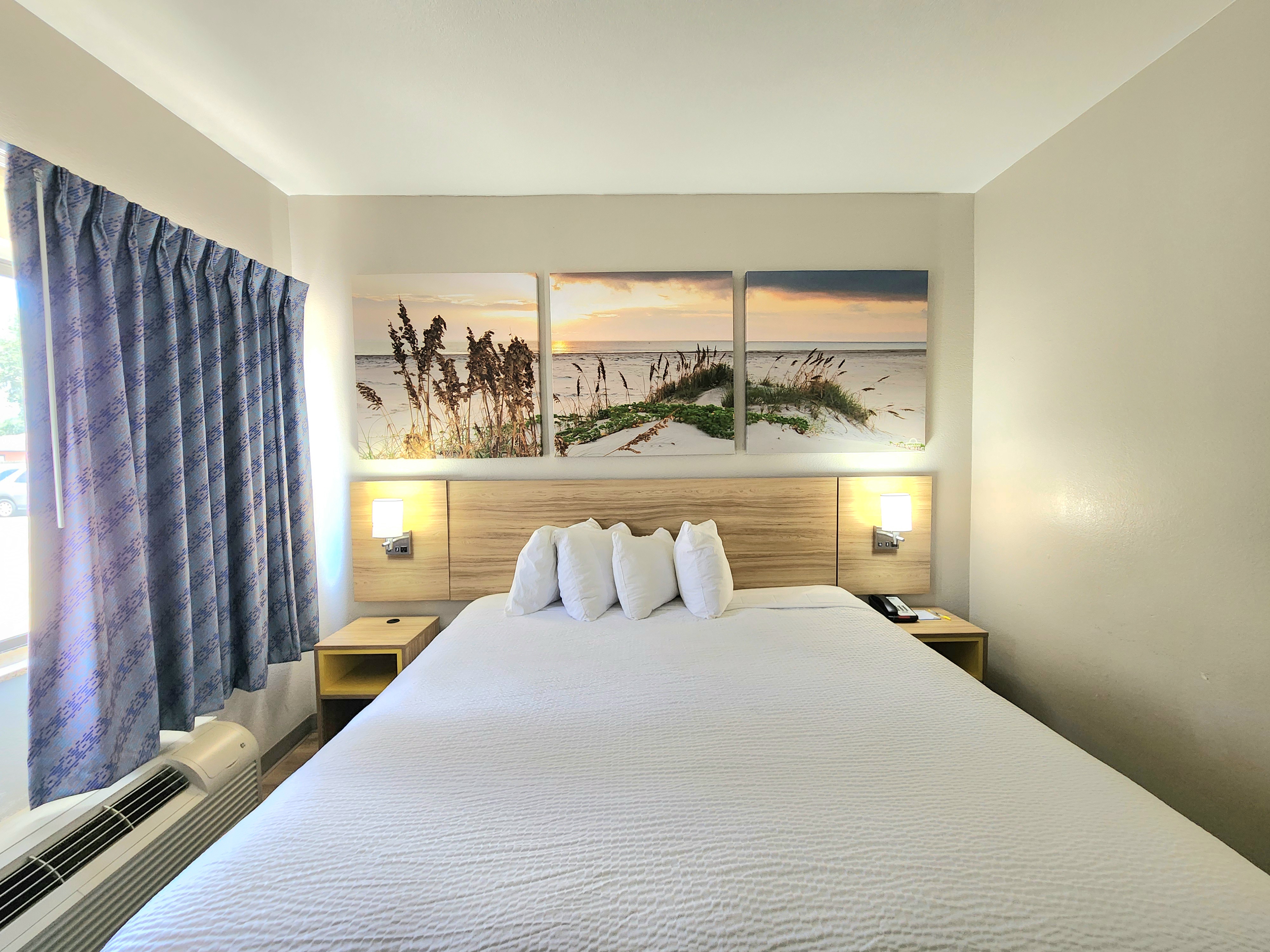 Guest room at the Days Inn & Suites by Wyndham Corpus Christi Central in Corpus Christi, Texas