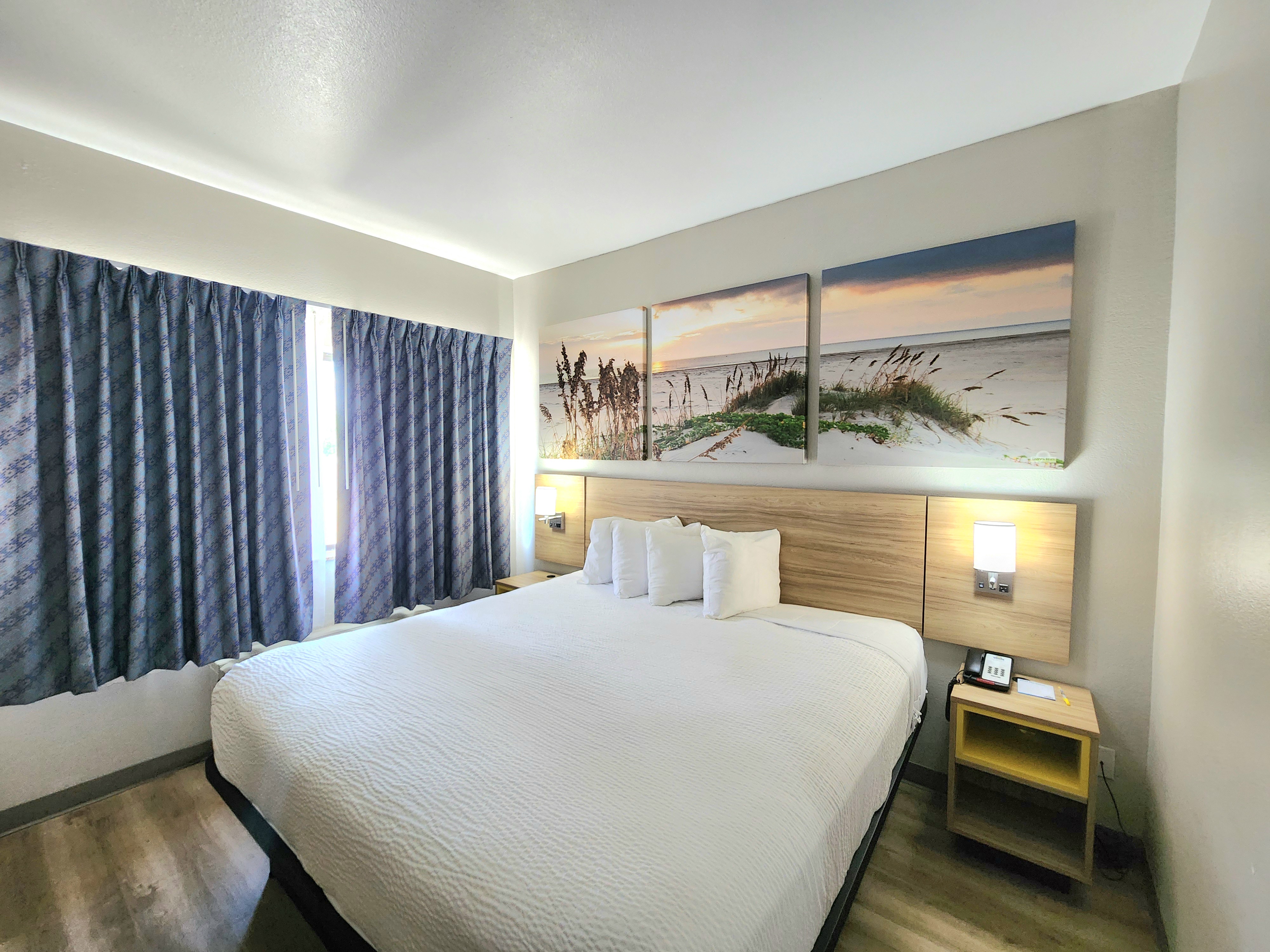 Guest room at the Days Inn & Suites by Wyndham Corpus Christi Central in Corpus Christi, Texas