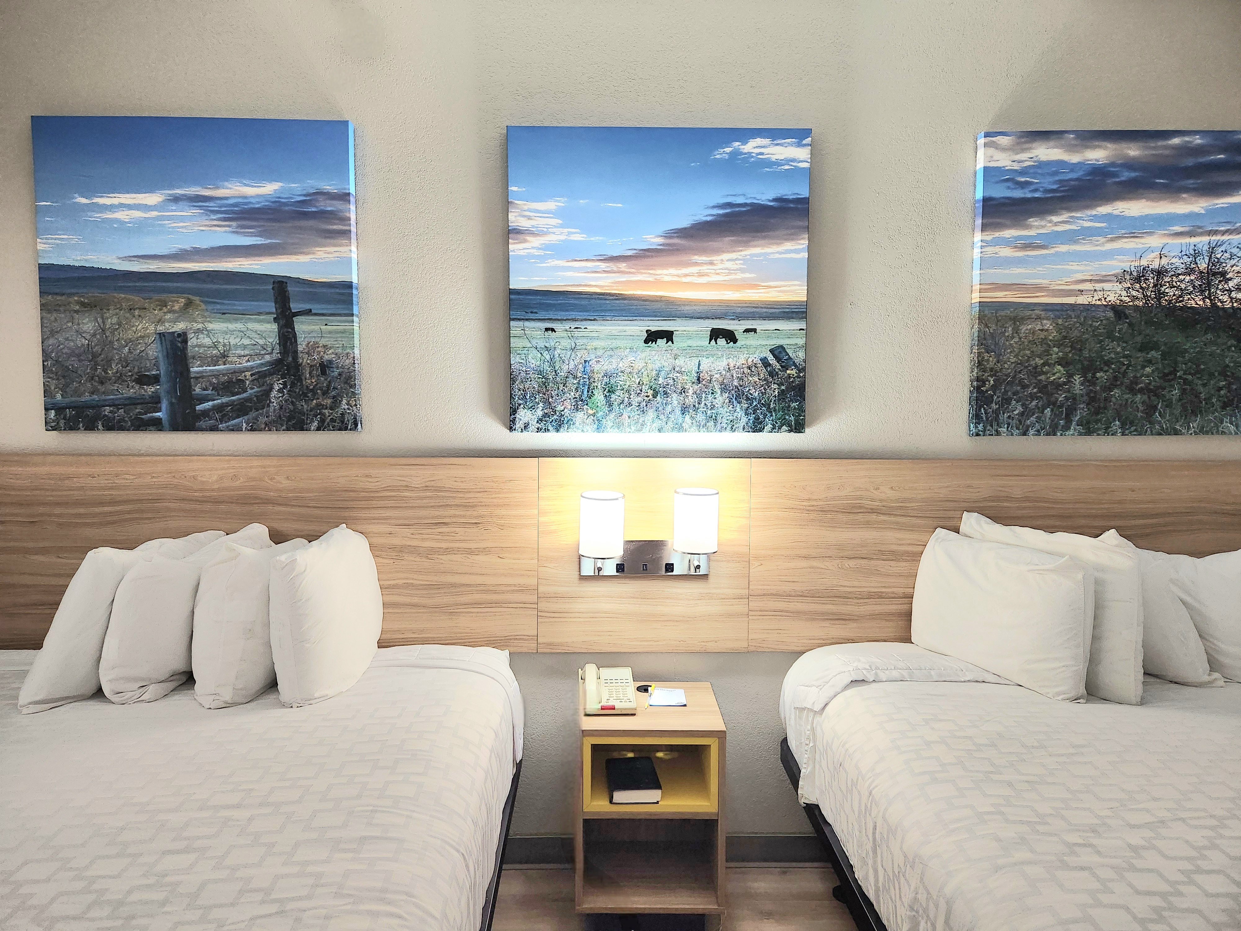 Guest room at the Days Inn & Suites by Wyndham Corpus Christi Central in Corpus Christi, Texas