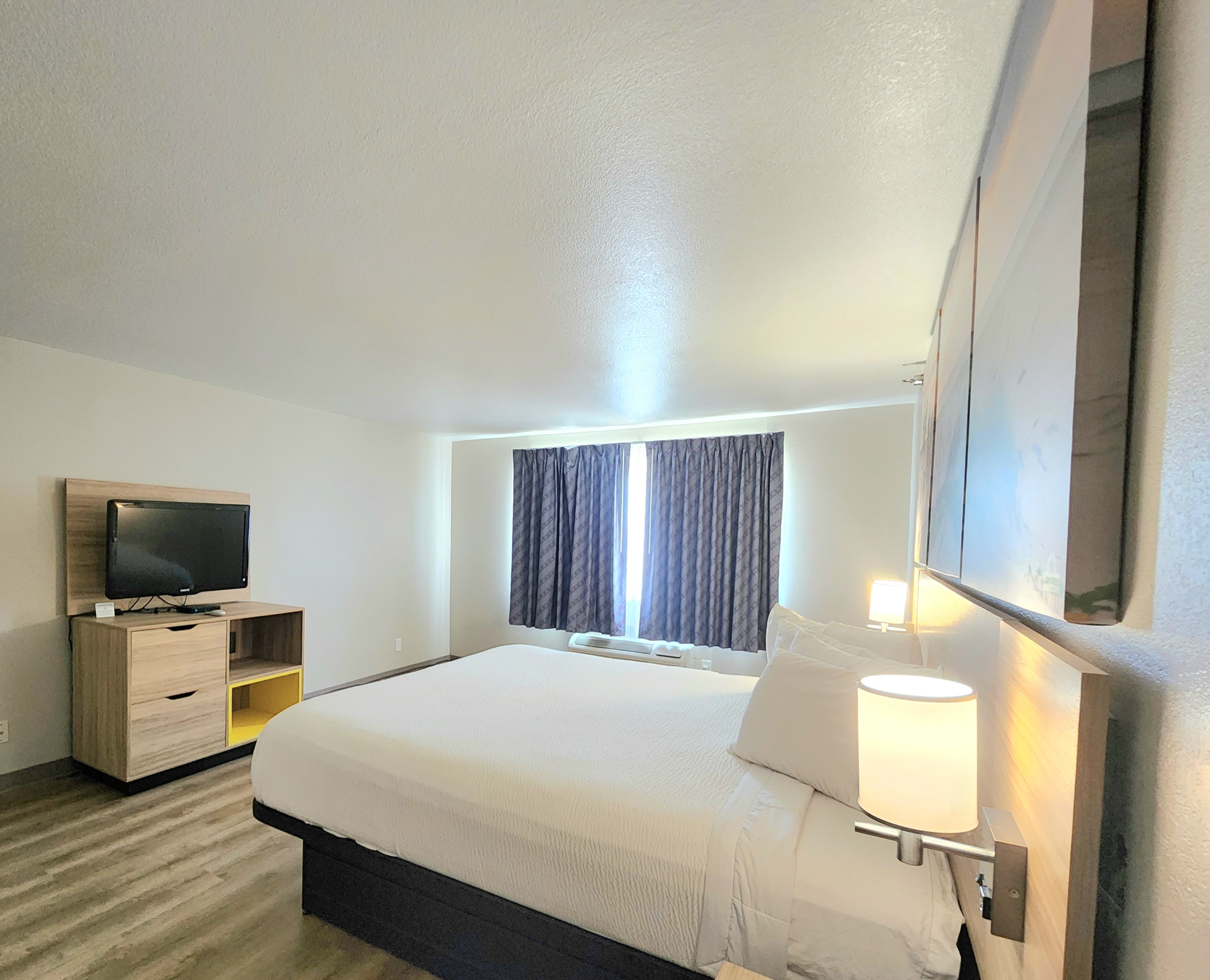 Guest room at the Days Inn & Suites by Wyndham Corpus Christi Central in Corpus Christi, Texas