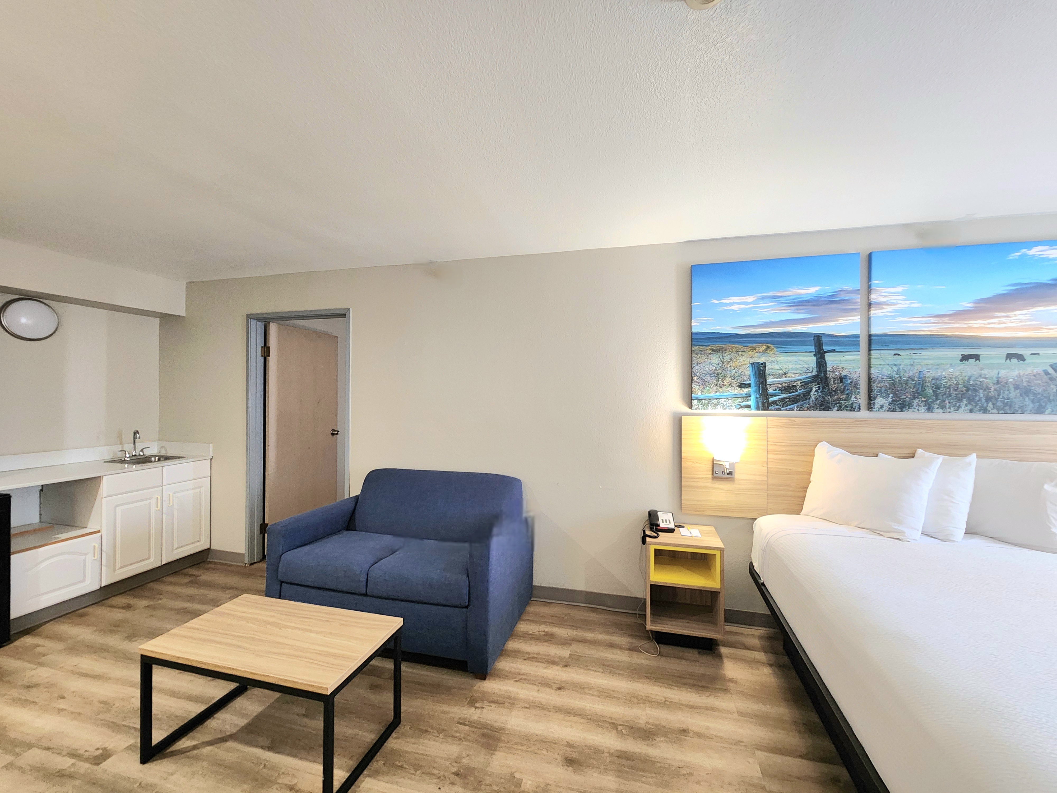 Guest room at the Days Inn & Suites by Wyndham Corpus Christi Central in Corpus Christi, Texas