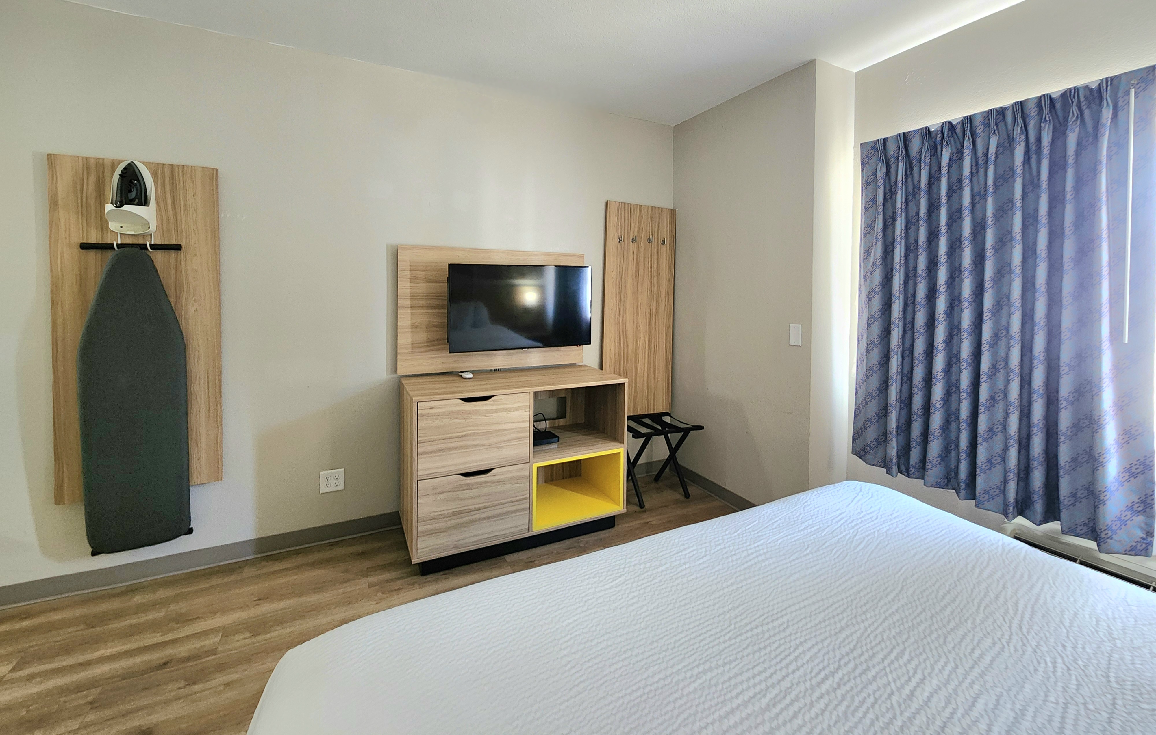 Guest room at the Days Inn & Suites by Wyndham Corpus Christi Central in Corpus Christi, Texas