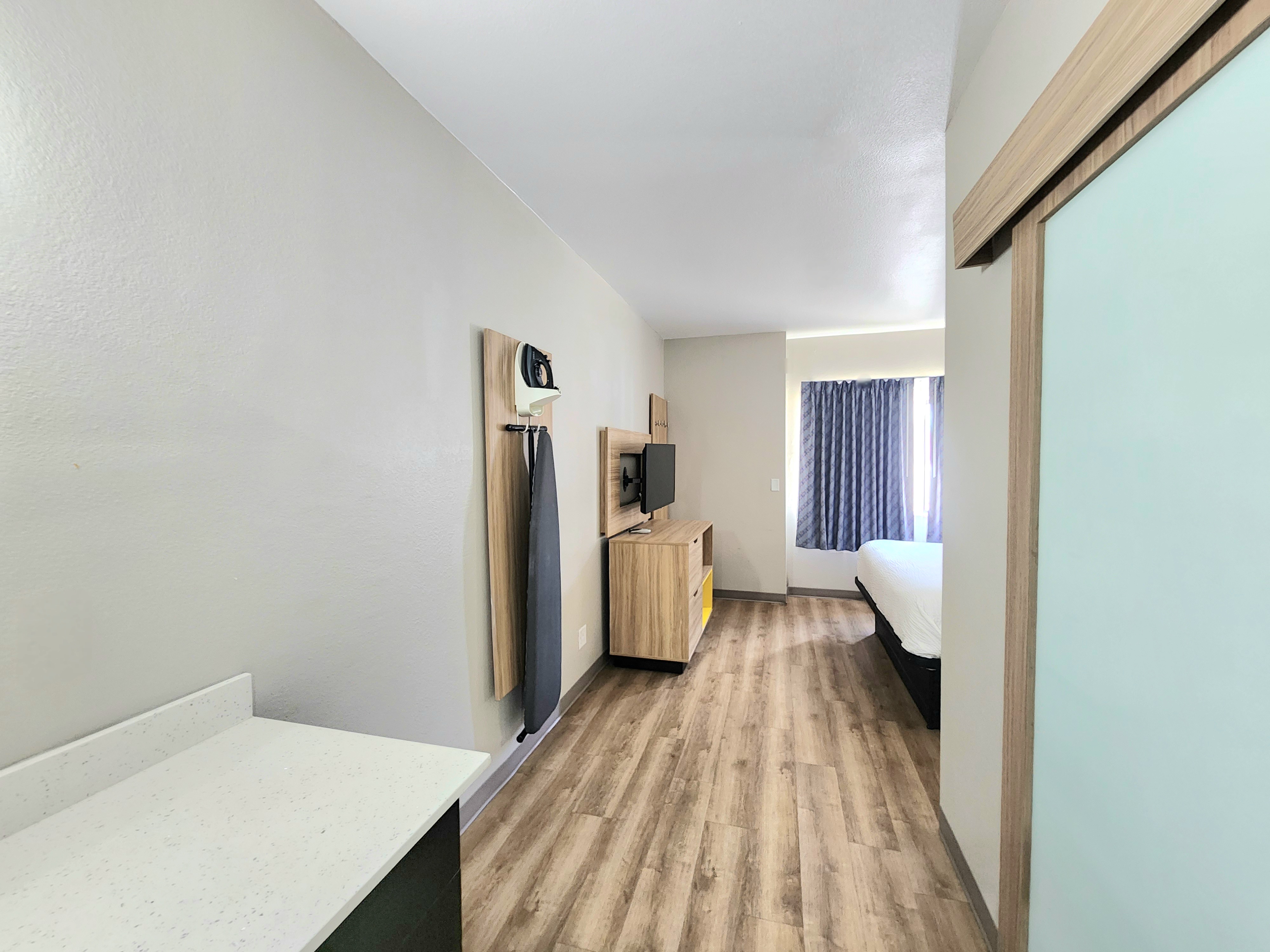 Guest room at the Days Inn & Suites by Wyndham Corpus Christi Central in Corpus Christi, Texas