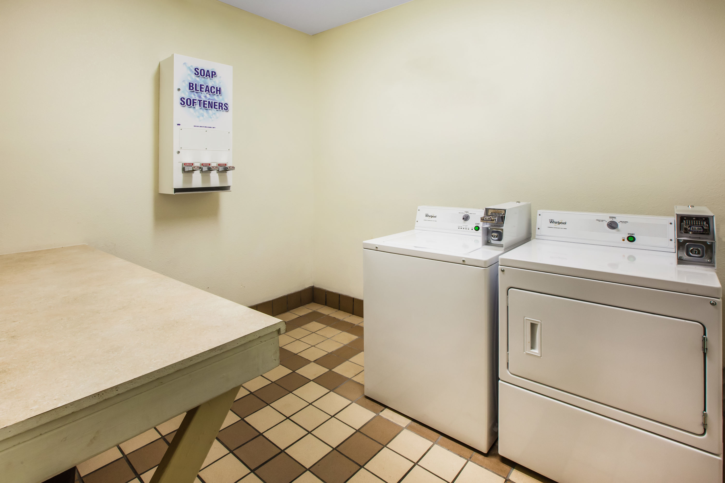 Laundry facilities at Days Inn & Suites by Wyndham Corpus Christi Central in Corpus Christi, Texas