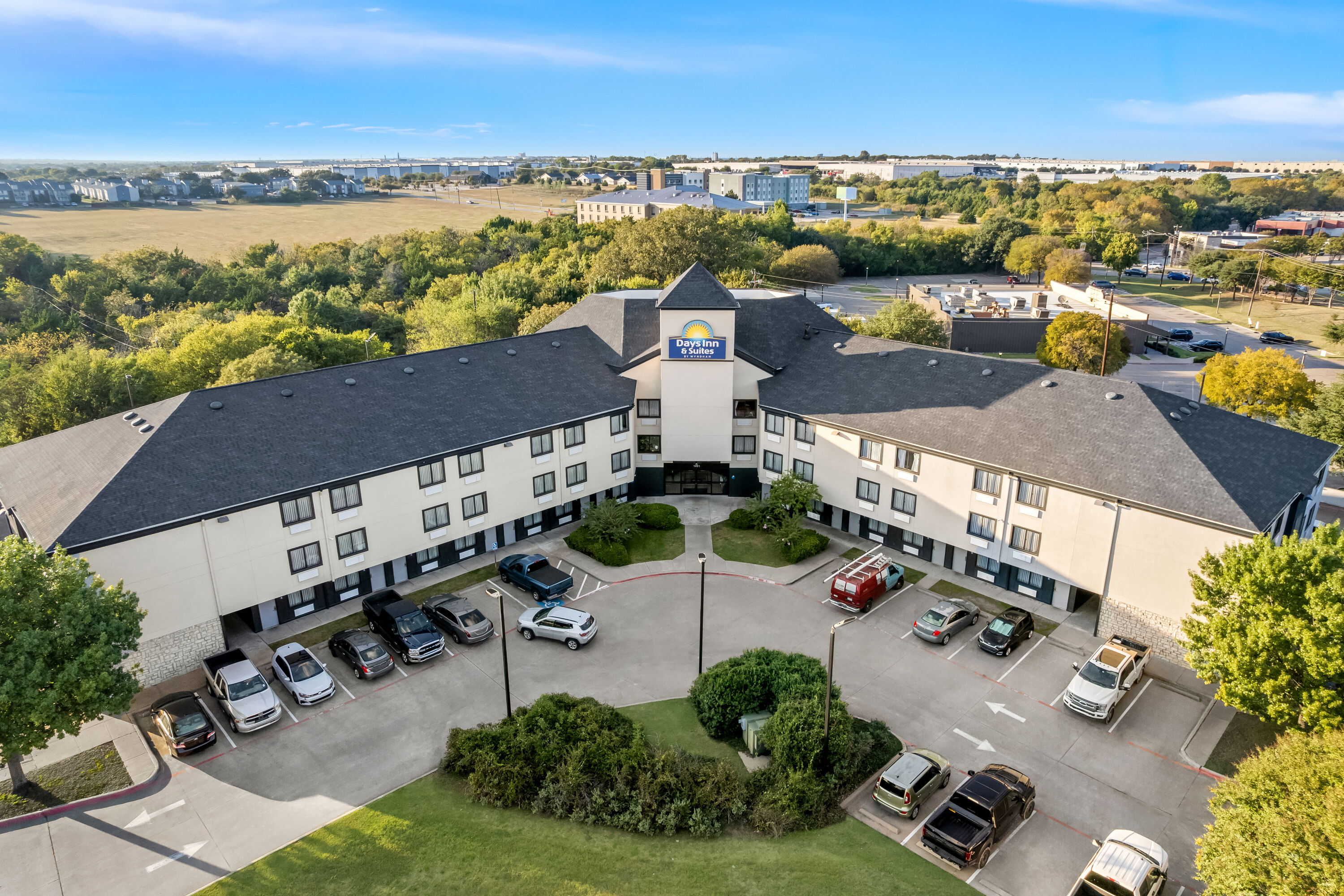 Aerial View of Days Inn & Suites by Wyndham DeSoto hotel in DeSoto, Texas