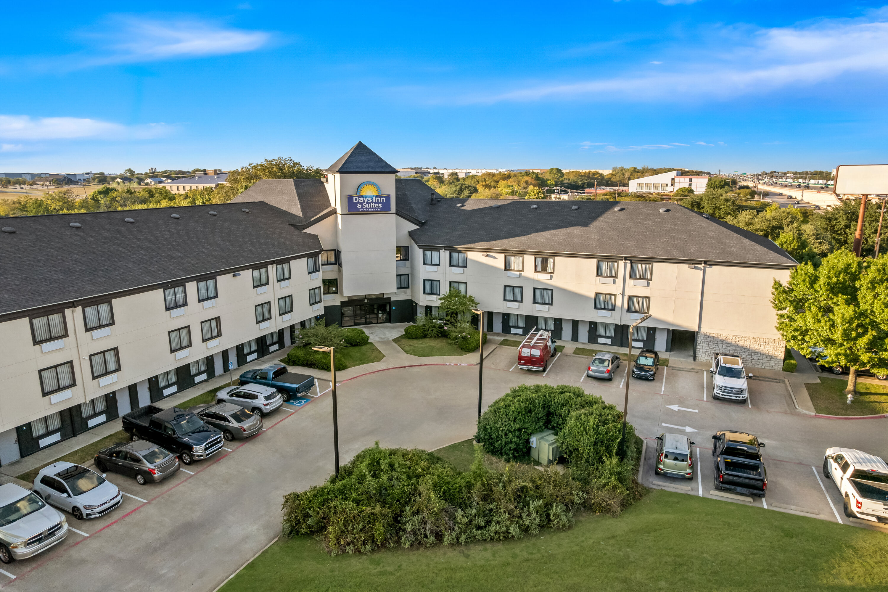 Aerial View of Days Inn & Suites by Wyndham DeSoto hotel in DeSoto, Texas